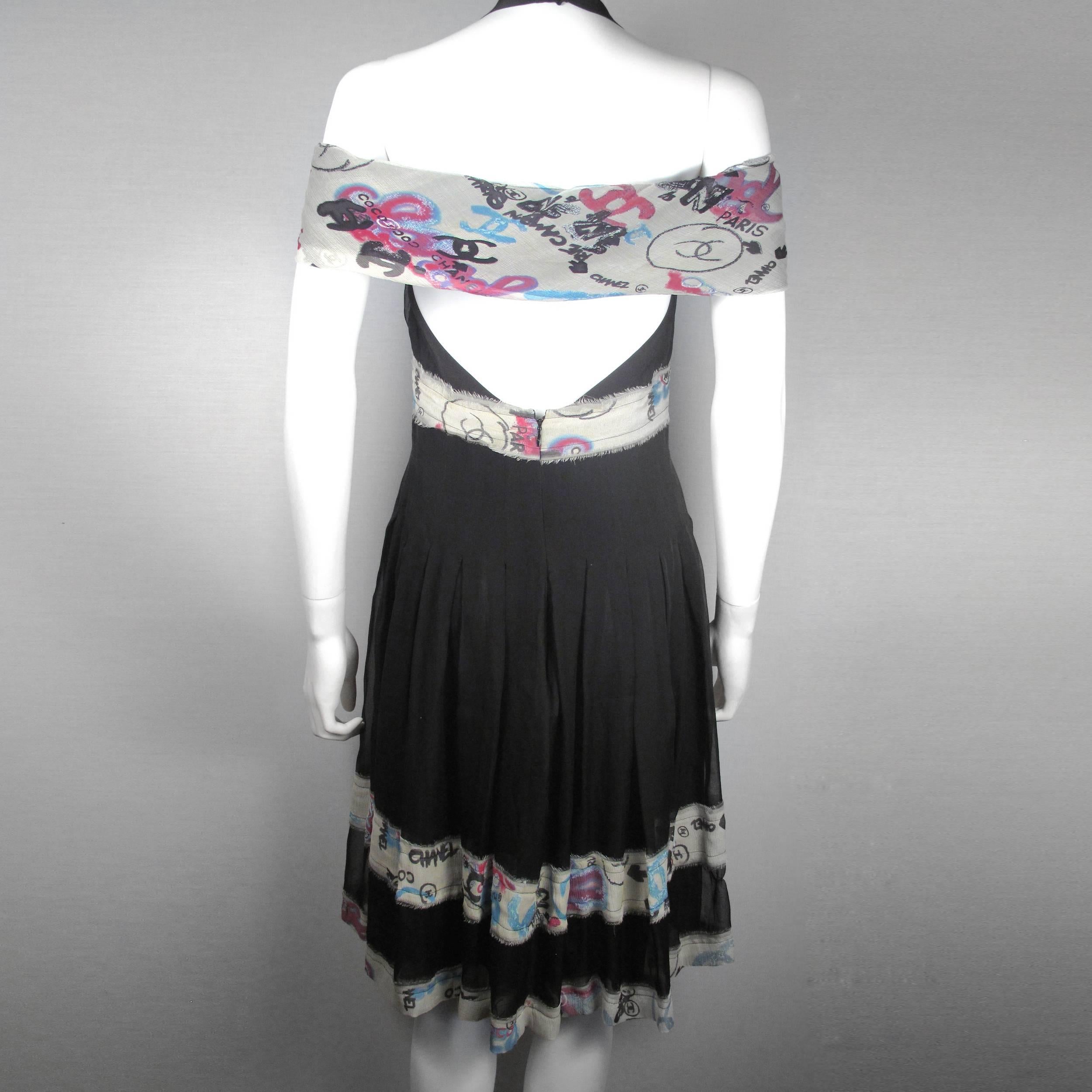 Chanel - Graffiti Dress

Size:  38 - 6 

Color:   Black

Material: 100% Silk

------------------------------------------------------------

Details:

- off the shoulder detail

- halter neck

- graffiti print trim

- zip back