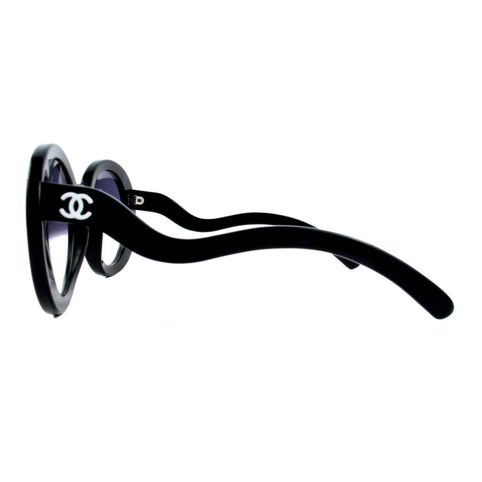 Chanel - Half Tint Sunglasses

Highly collectable - sold out worldwide instantly

Color: Black

------------------------------------------------------------

Details:

- round lenses

- white CC logos at temples

- silver tone