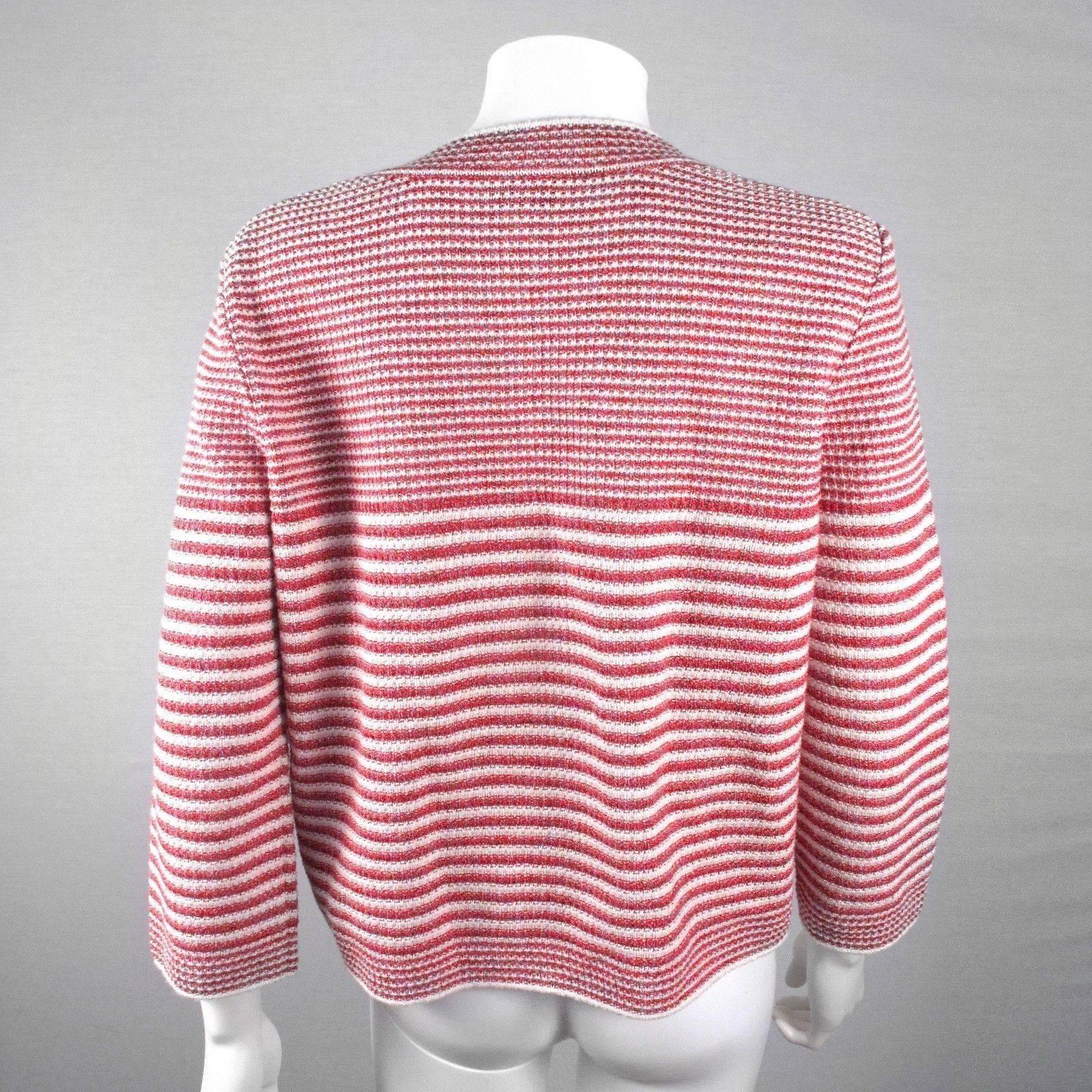 Chanel - 2014 Striped Cardigan Jacket

with Pearl Buttons

Tag Size:  44 - US 10 / 12

Color:   Red / White

Material: 41% Paper - 31% Cotton - 28% Silk 

------------------------------------------------------------

Details:

-