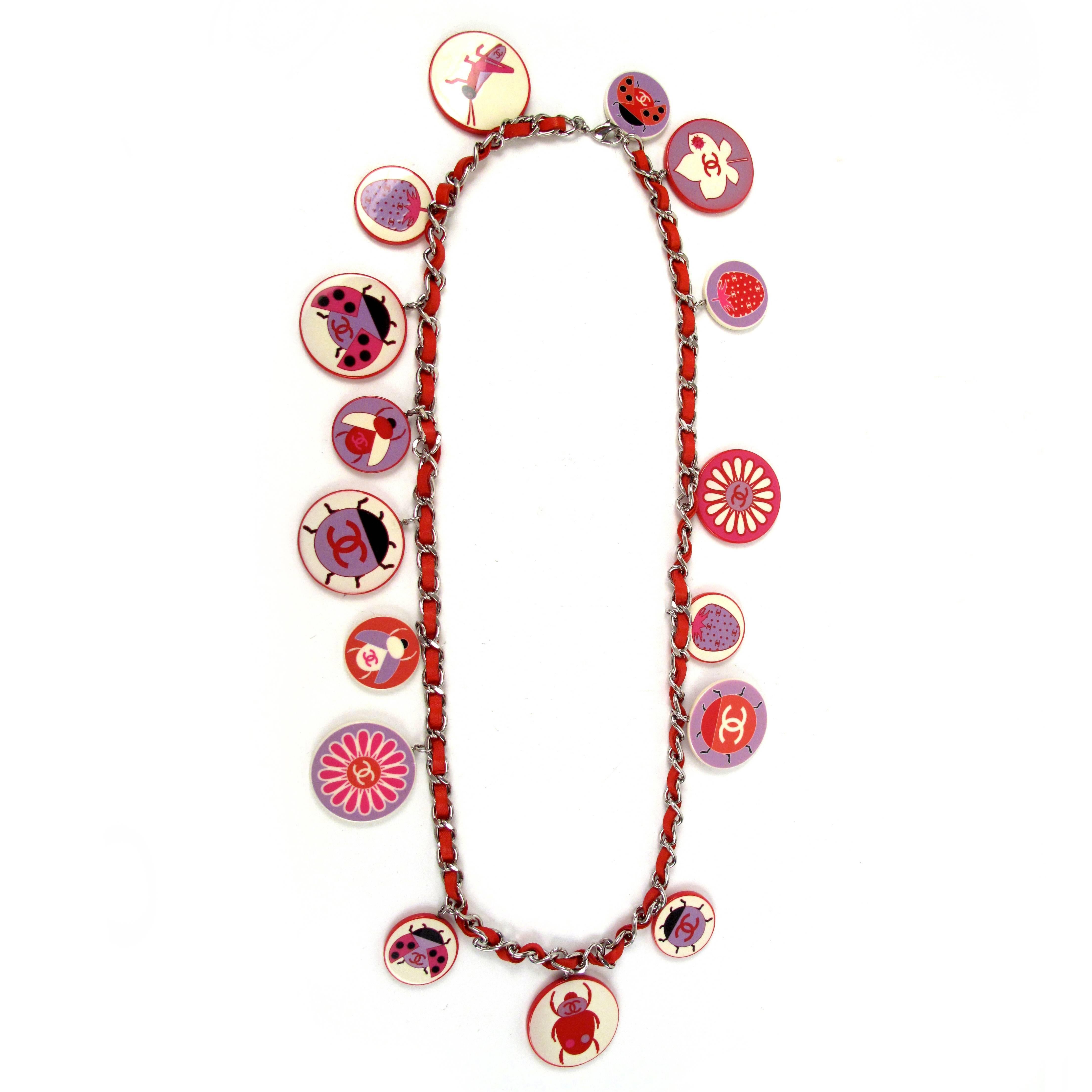 Brand New:

Chanel - Ladybug Charm Necklace / Belt

Rare Collectors item!

Color: Red / Multi

Material: Leather

------------------------------------------------------------

Details:

- red leather woven chain

- silver tone