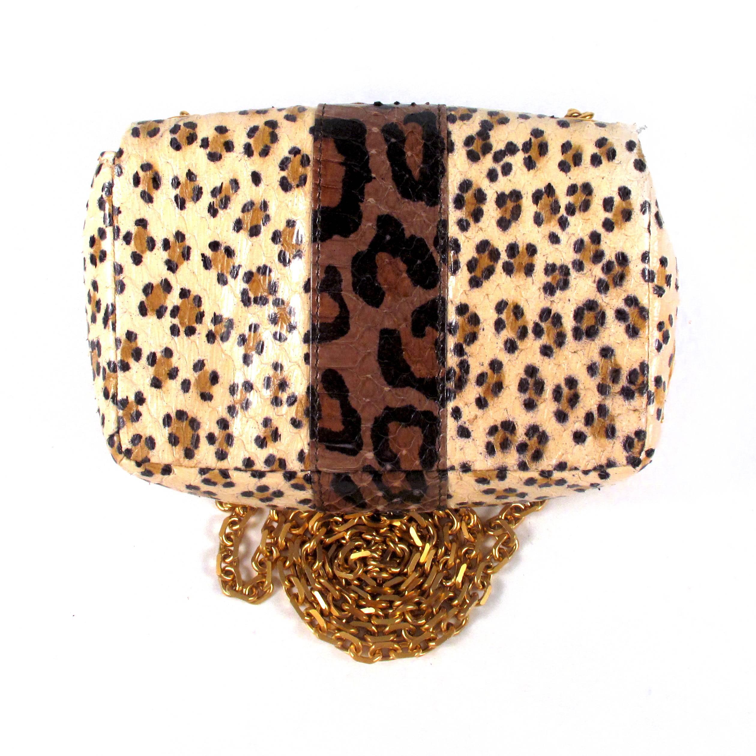 Christian Louboutin - Leopard Print Crossbody Bag

Color: Multi

Material: Leather

------------------------------------------------------------

Details:

- long crossbody chain shoulder strap

- gold tone hardware

- embossed pattern