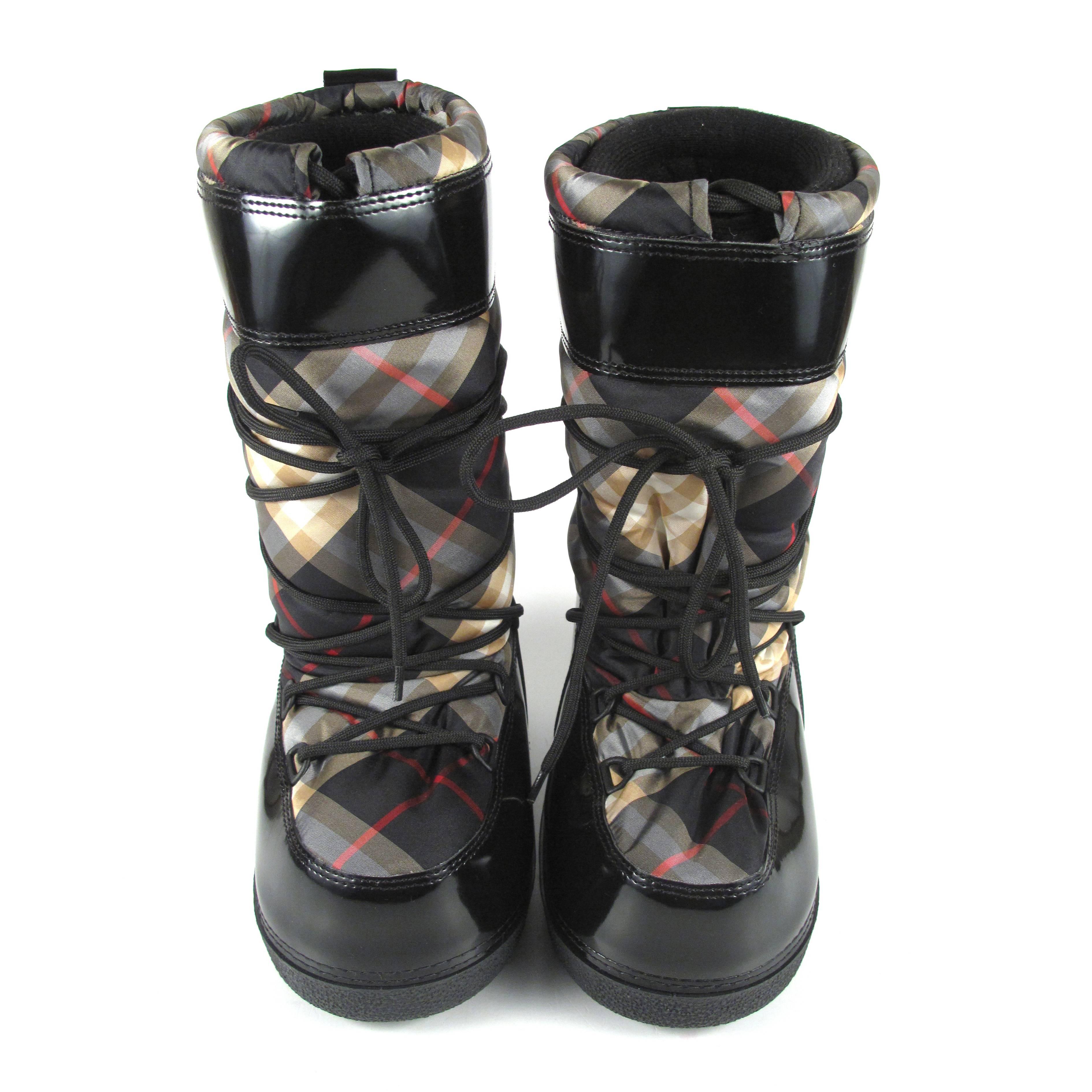 BRAND NEW:

Burberry - Snow Boots

Size: 37 - US 7

Color: Black / Multi

Material: Leather

------------------------------------------------------------

Details:

- signature plaid pattern

- lace up closure

- includes box

-