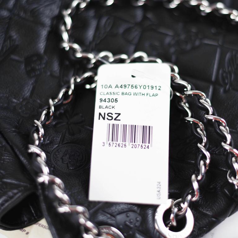 Chanel new Maxi Lucky Charms Symbols Bag - Black Leather CC Logo Flap  Embossed at 1stDibs