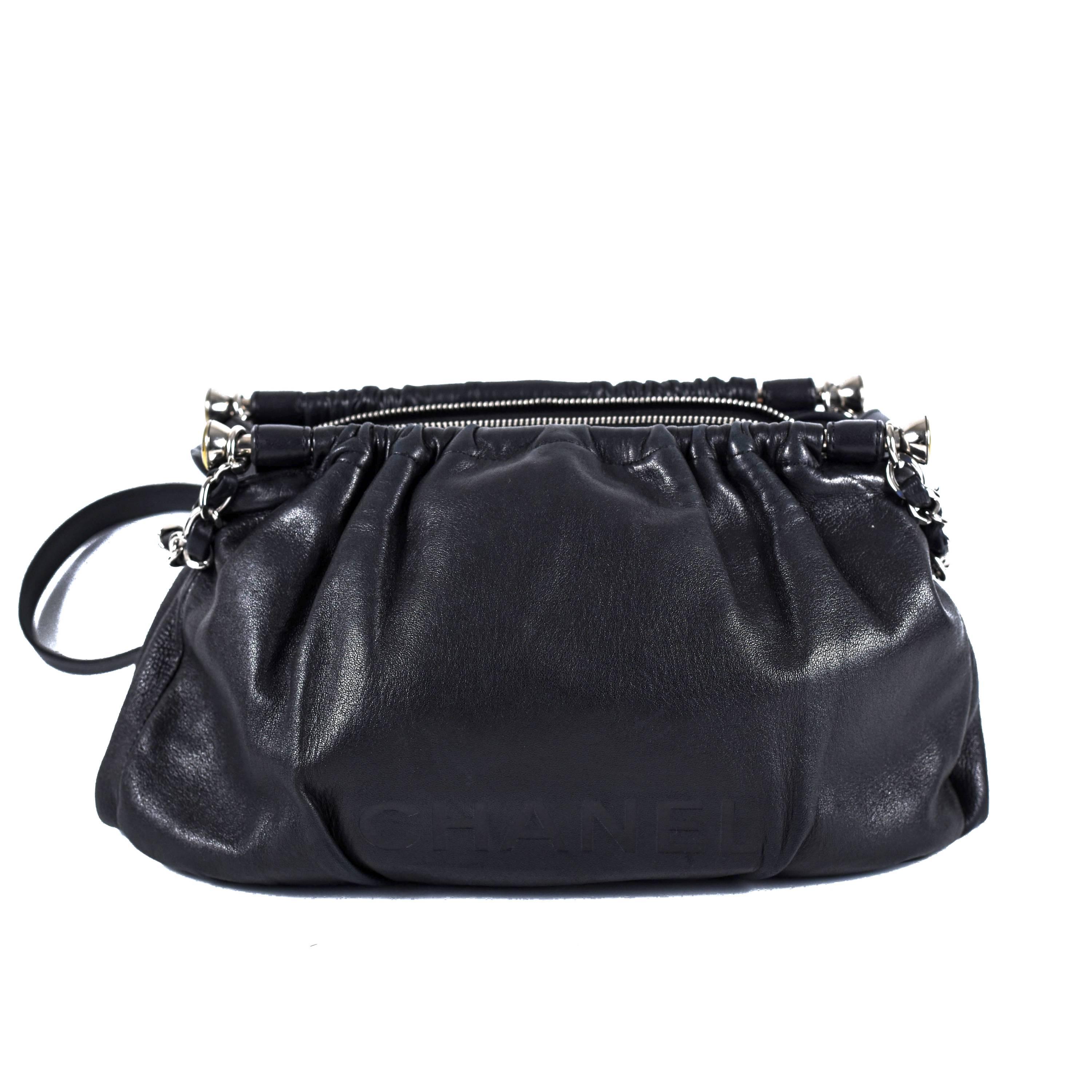 Chanel - LAX Frame Shoulder Bag

Color: Black

Material: Leather

------------------------------------------------------------

Details:

- silver tone hardware

- CHANEL logo embossed at front

- leather shoulder straps

- chain