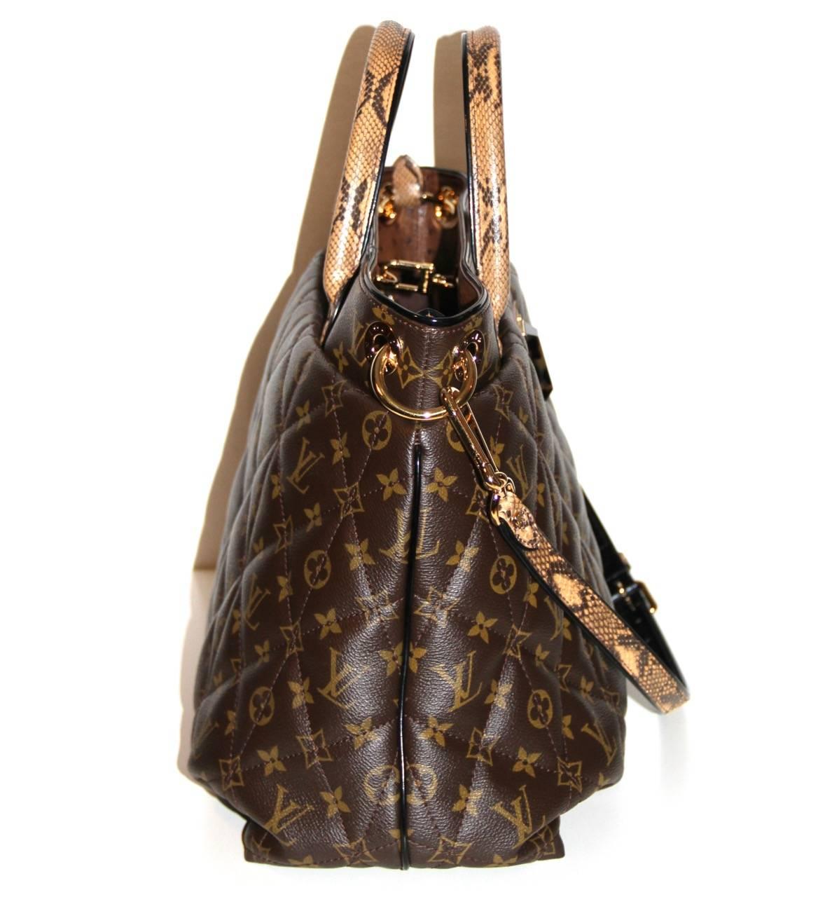 The signature Monogram Canvas has been softly quilted and the bag features python handles and adjustable, removable shoulder straps, black patent leather trim, an ostrich inside trim, one front pocket with tiger eye twist lock, an open top with snap
