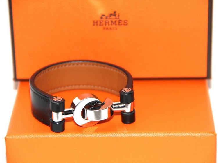 Hermes Black Box Leather Bracelet Silver Hardware Handcuffs Clasp at  1stDibs | hermes handcuff, hermes clasp, handcuffs black box