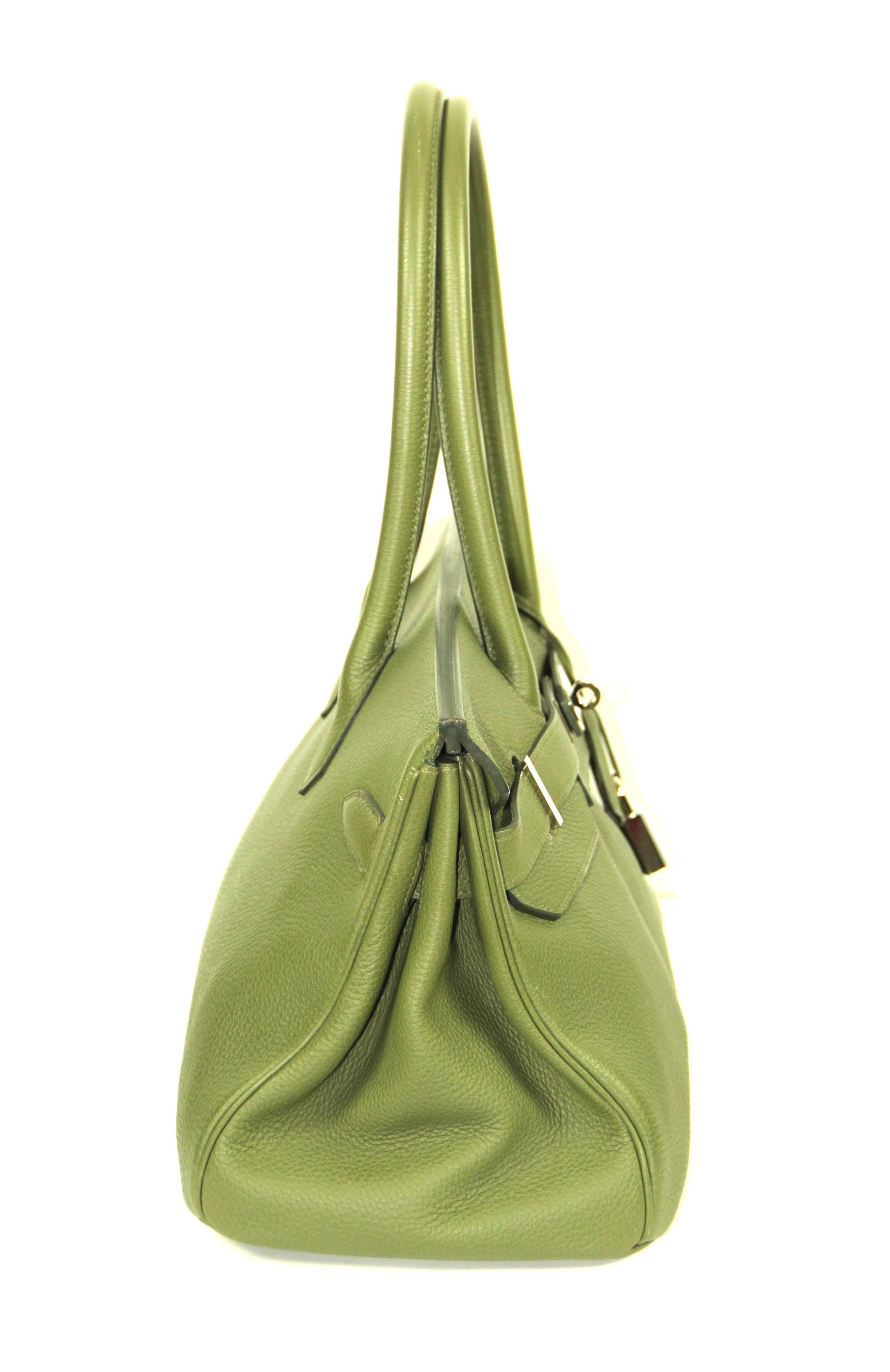 The Birkin Shoulder bag has been designed by Jean Paul Gaultier when he joined Hermes in 2004. This fashion bag is in excellent condition. 

Year: 2013 
Material: Togo leather
Color: Military Green 
Hardware: Palladium 
Measurements: L 42 cm x H 18