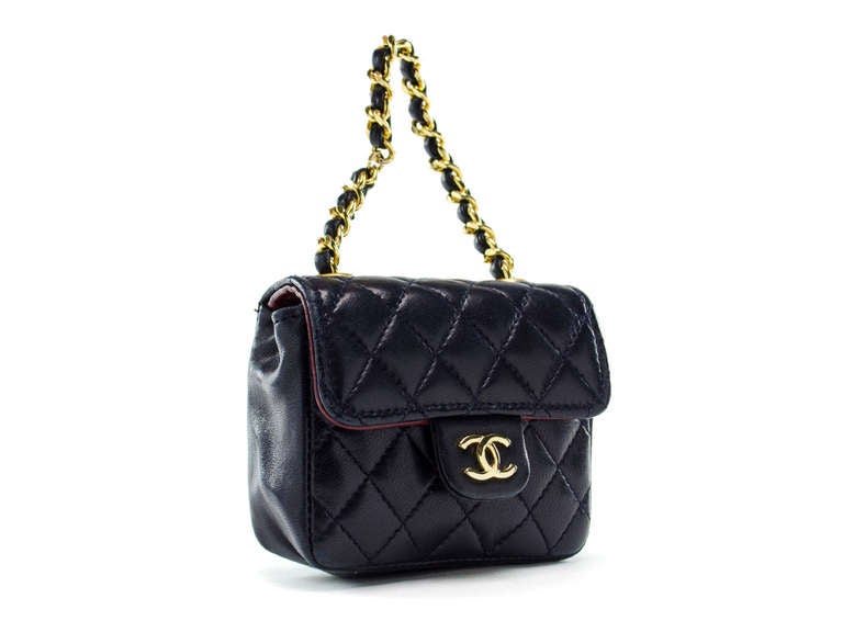 Just need a small pick me up? Pack this Chanel mini flap for a fun night out on the town with the girls. This Chanel bag features quintessential Chanel diamond pattern details, black lambskin, gold tone hardware, snap closure.

Dimensions: 3.25
