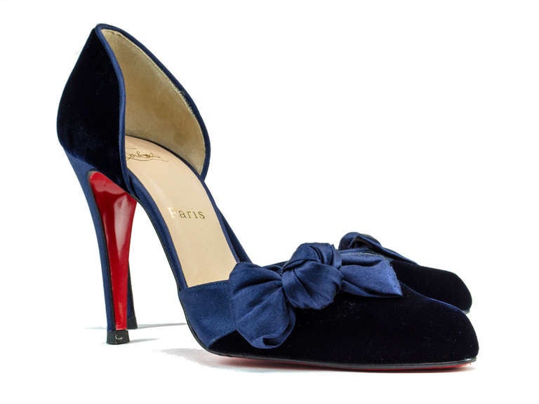 Red soles just got sexier with the addition of blue velvet. This heel is perfect for a special occasion or when you wish to add a little bit of seduction to your look. D'orsay design features velvet with satin finishes on the vamp and a 4