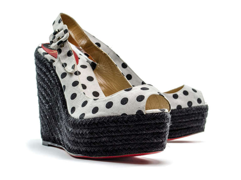 Brand New, Christian Louboutin Menorca wedges in black and white polka dot with black espadrille heel. Heel measures approximately 5