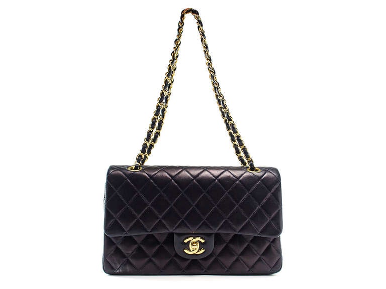 Chanel Black Quilted Lambskin Leather Classic Medium Double Flap Bag Description Go in style with this gorgeous Chanel Vintage Black Quilted Lambskin Leather Medium Classic Double Flap Bag. The gorgeous and black quilted lambskin leather is so soft