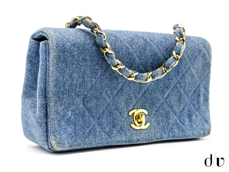 Feel like keeping it casual without sacrificing your style? Head out in this darling vintage Chanel denim flap to add an element of chicness to any outfit! This bag is featured in a medium tone denim with gold tone hardware. Interior features two