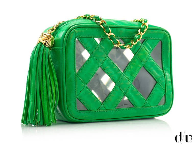 Condition: Good with slight signs of wear Color: Green

Combination of calf leather and transparent diamond shaped squares incorporated in the signature Chanel pattern design will definitely turn heads! Gold hardware is enhanced with a 5