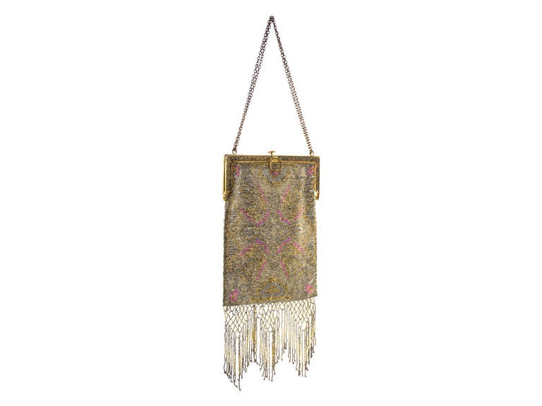 What a beauty! Whiting & Davis vintage beaded handbag in silver, gold, pink and green. Fringe beaded detail at bottom.
