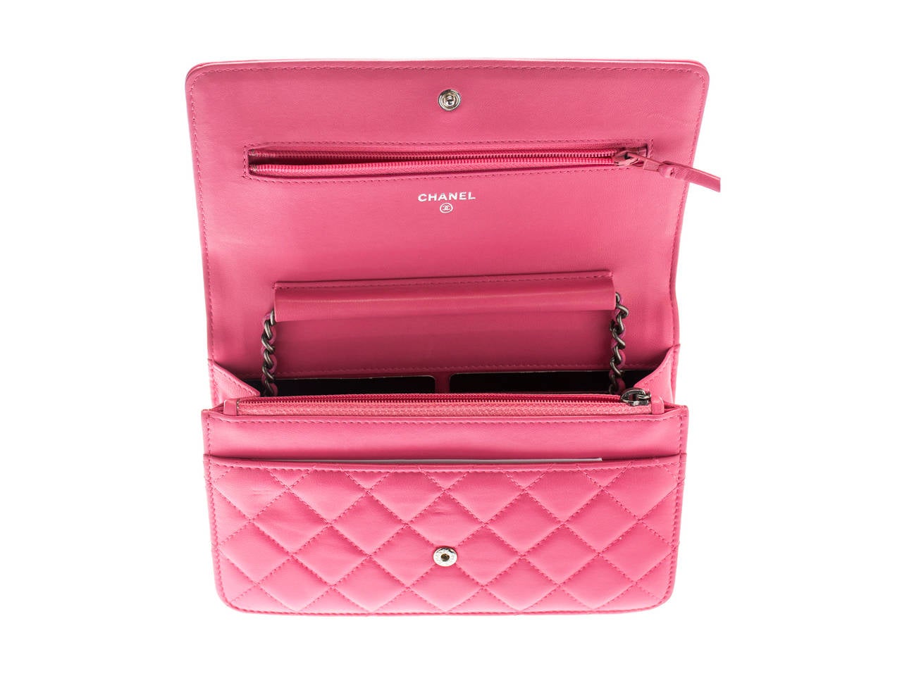 Extremely sought after and impossible to find is the Chanel WOC (Wallet on Chain) pink boy bag! This bag is featured in lambskin leather with rhodium hardware. One interior zip pocket with multiple card slots.