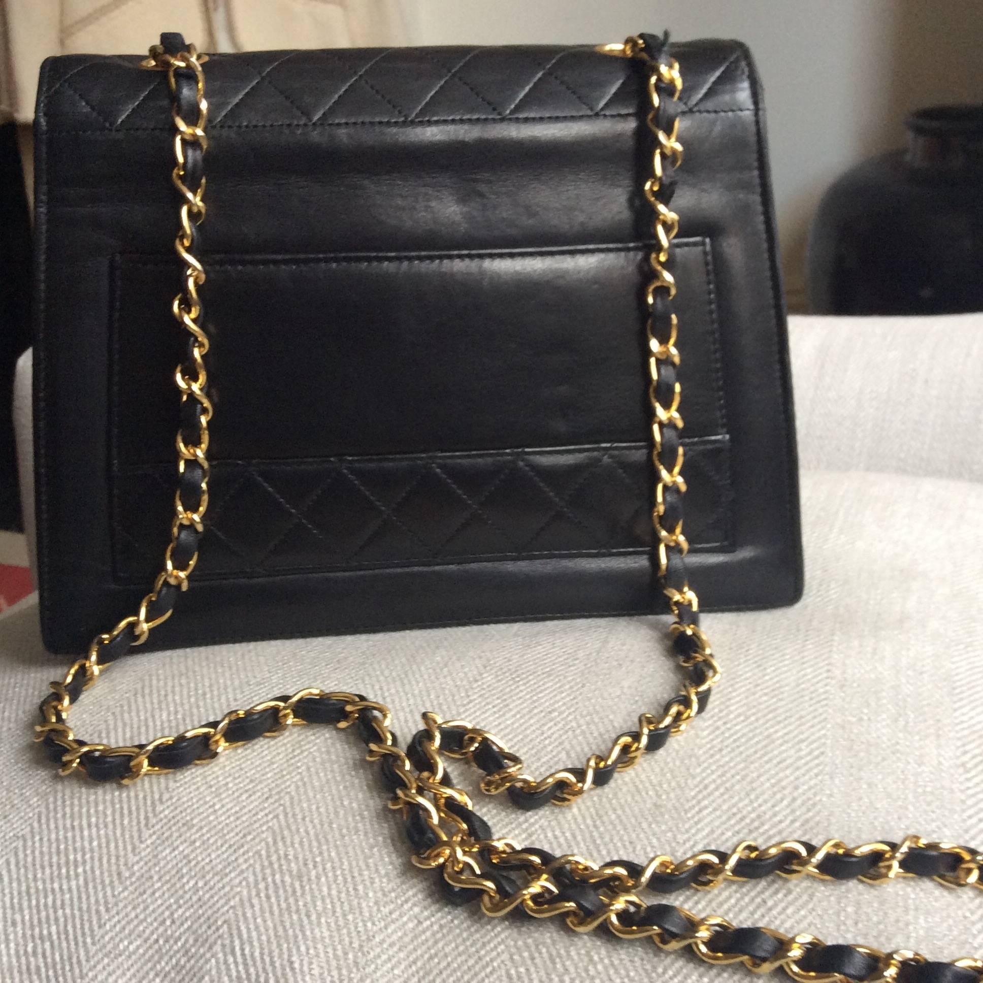 Chanel black lambskin quilted shoulder bag.
Classic Chanel diamond style stitching , turn style lock with Chanel embosed on it.

Dated 1989 to 1991

Serial Number 1635314