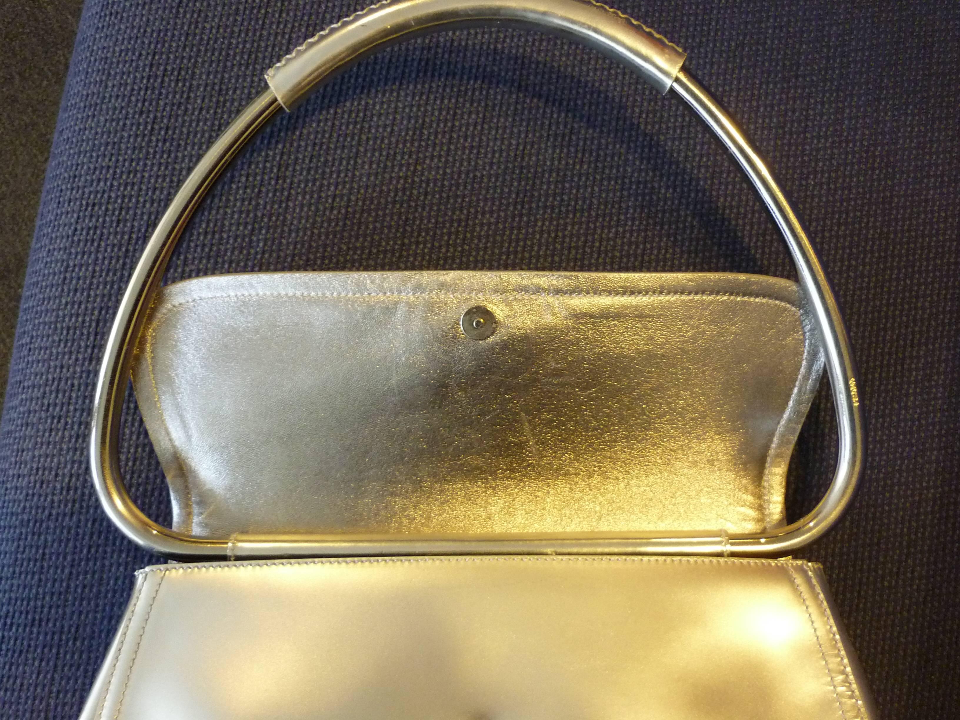 prada metal handle bag