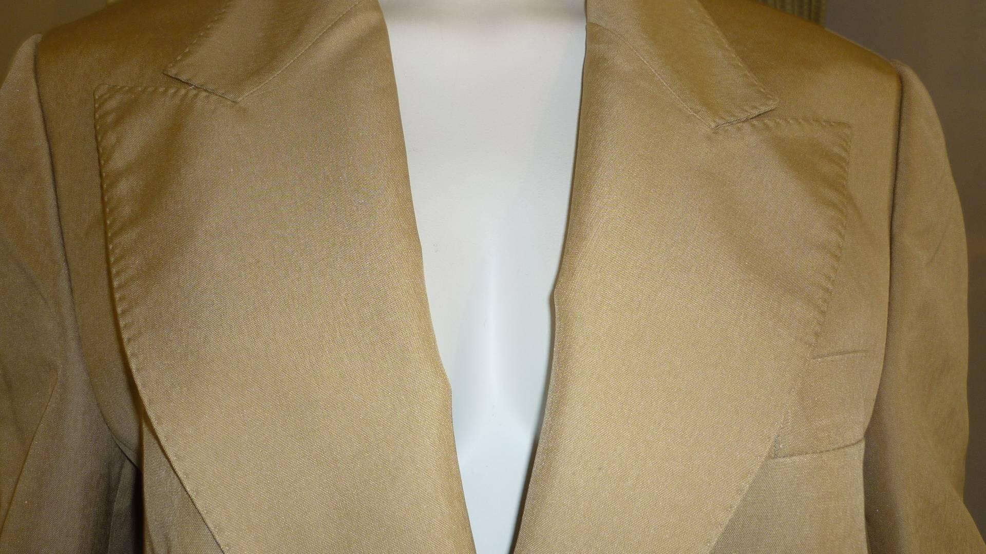 Beautifully tailored jacket designed by either Tom Ford or Alessandra Facchinetti.

This all silk jacket/blazer has oiping throughout two inside pockets as well as on slit breat pocket and two flap front pockets that have yet to be opened. 

The