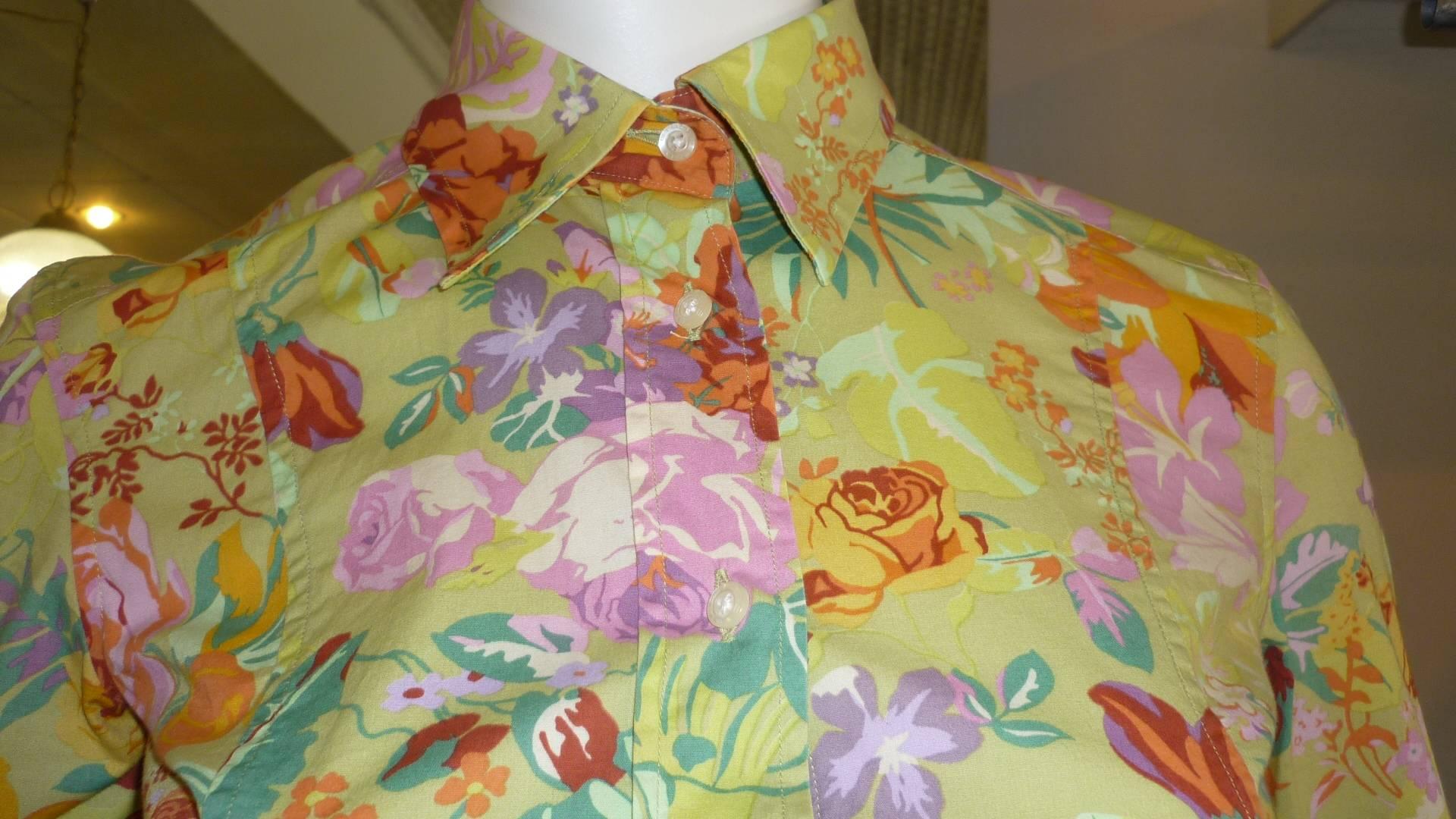 Multicolored floral design fitted cotton shirt with Etro signed buttons.