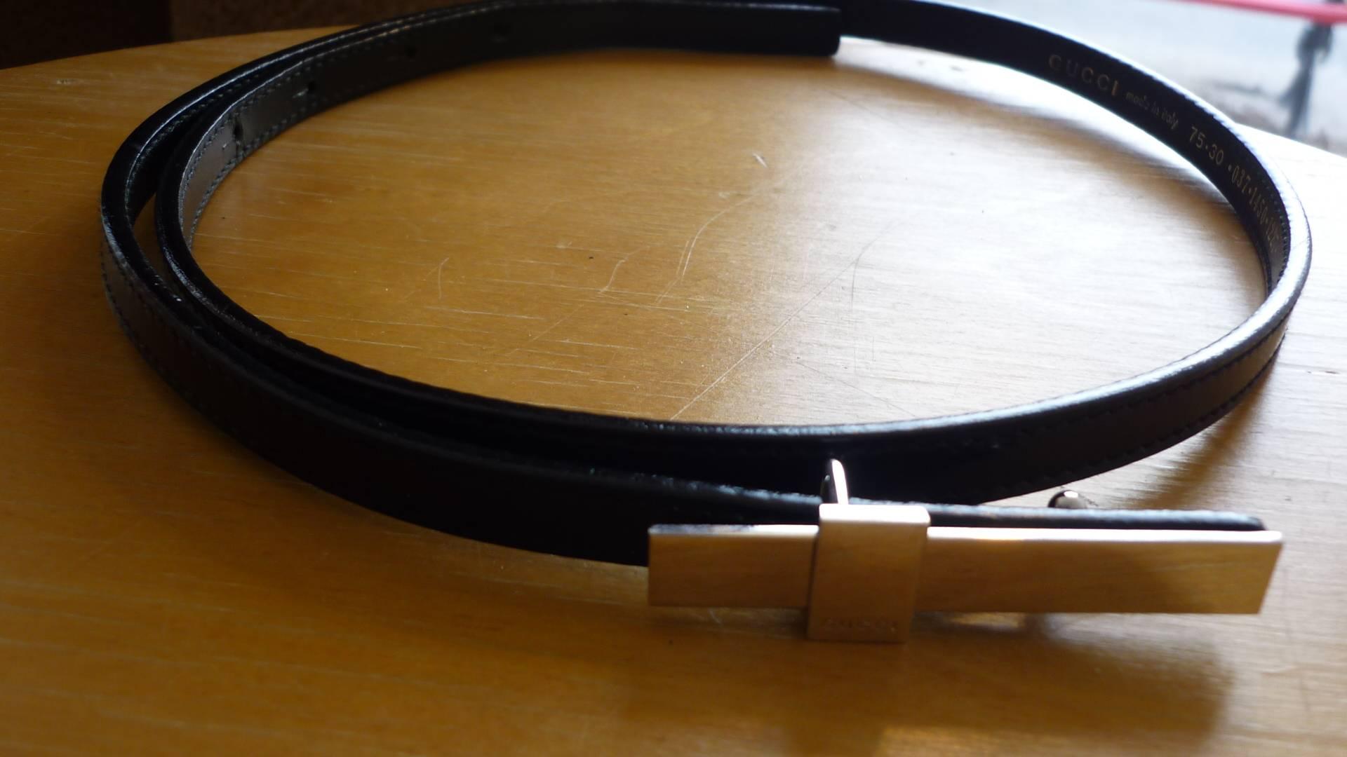 thin black patent leather belt