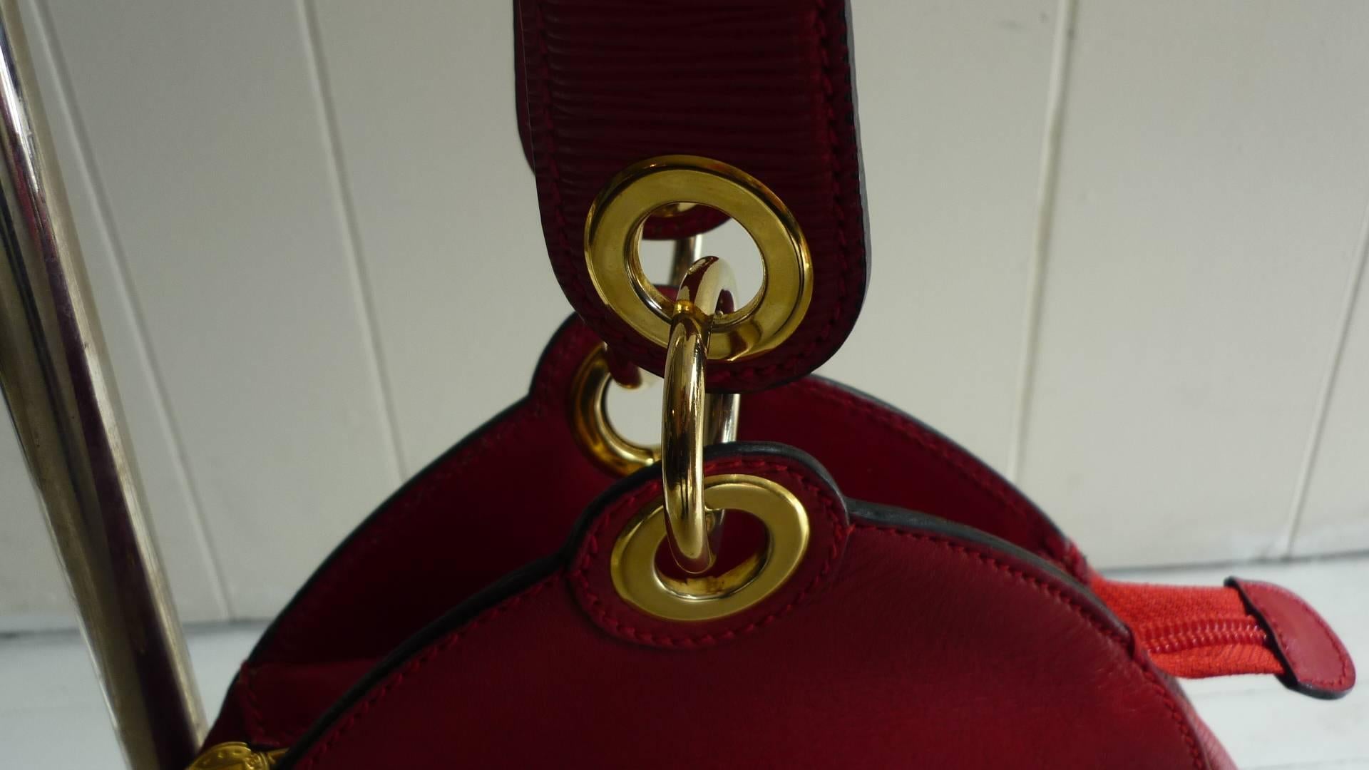 1990s Unusual Red Leather Fendi Handbag with Janus Roman Heads Medallion In Excellent Condition In Port Hope, ON
