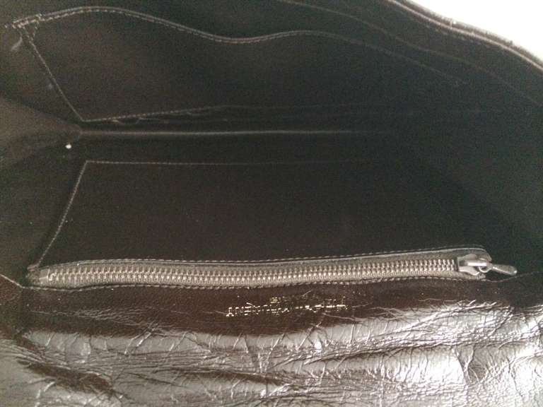 Yves Saint Laurent Leather clutch 2