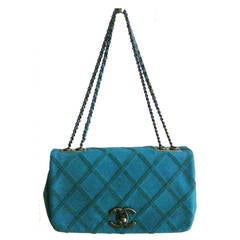 Stunning CHANEL Turquoise Handbag with Signature Ribbed Quilting