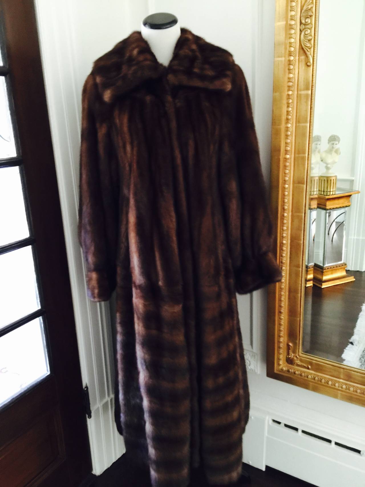 Designed by the master himself , Karl Lagerfeld ,
and manufactured in Canada by the finest fourrier this coat 
is stunning and luxurious...