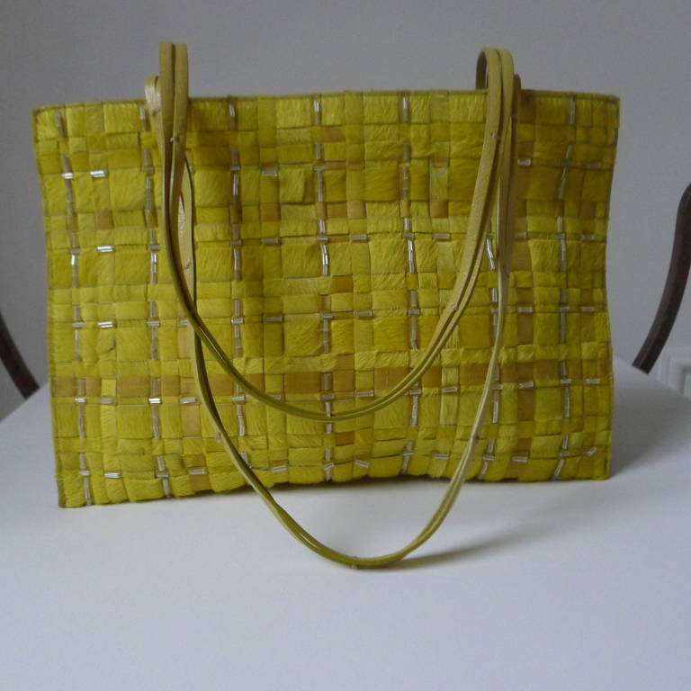This unique evening bag by Bottega Veneta is woven with pony hair and beading.
In a lovely Chartreuse colour...
Italian handmade...
Italian Elegance..
The bag is in excellent condition and has a dust bag
Magnetic closure
width 11