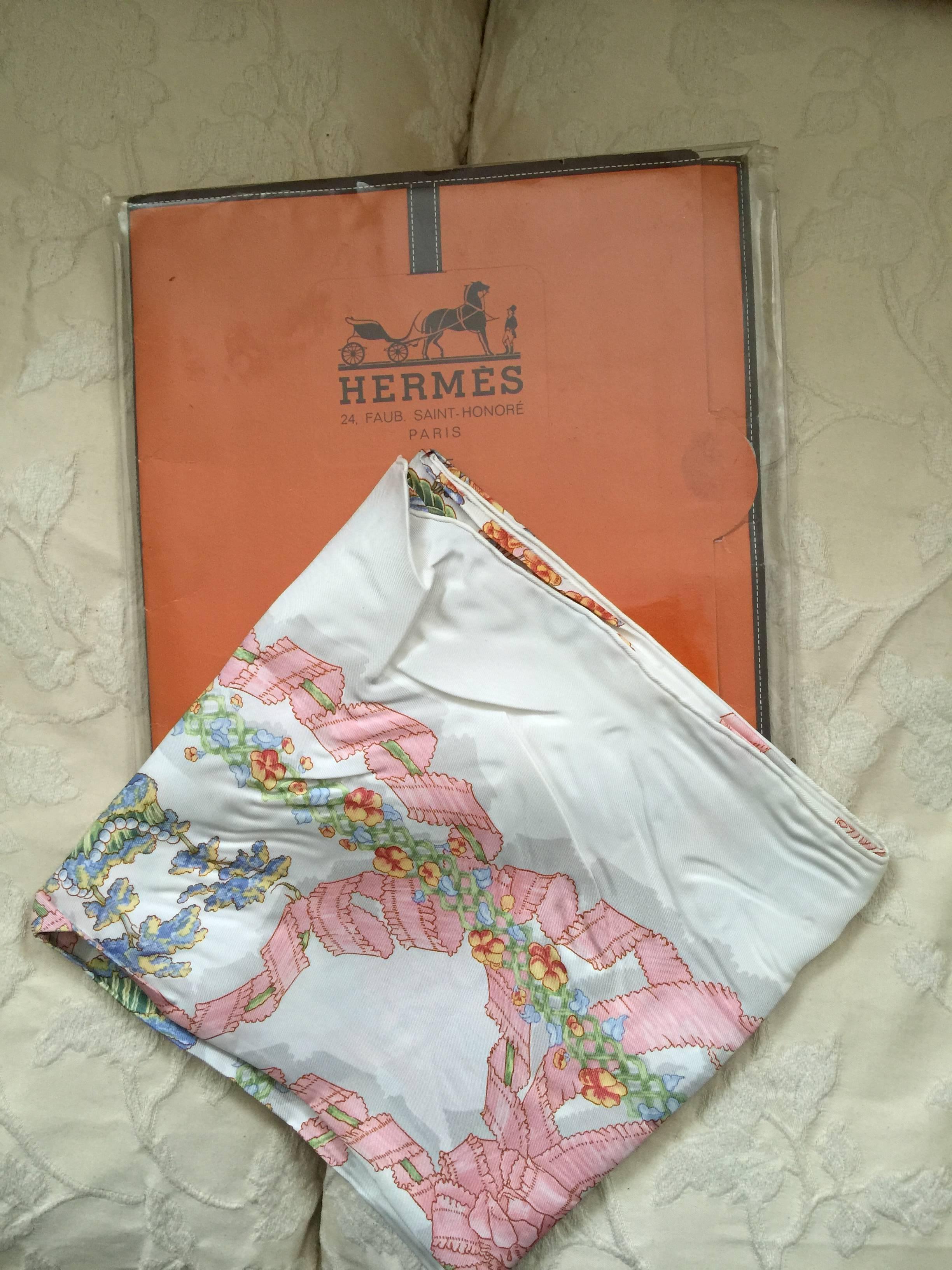 Pristine never worn in original package this Hermes scarf is elegant and delicate.
