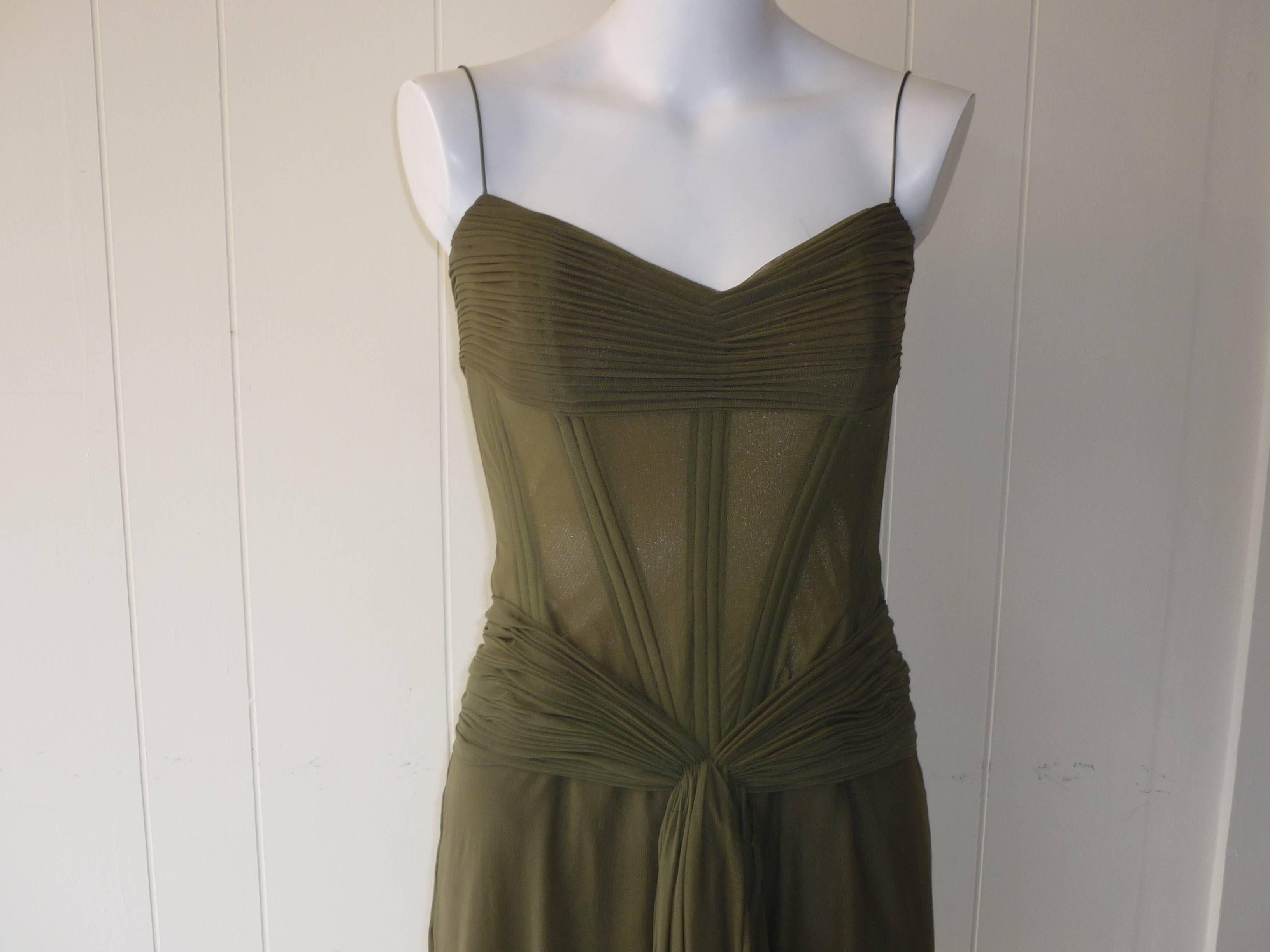 Beautiful pleated corset drapedand ruched dress. The bodice is fully line for support and there are stays (boning) from the top to the waist.