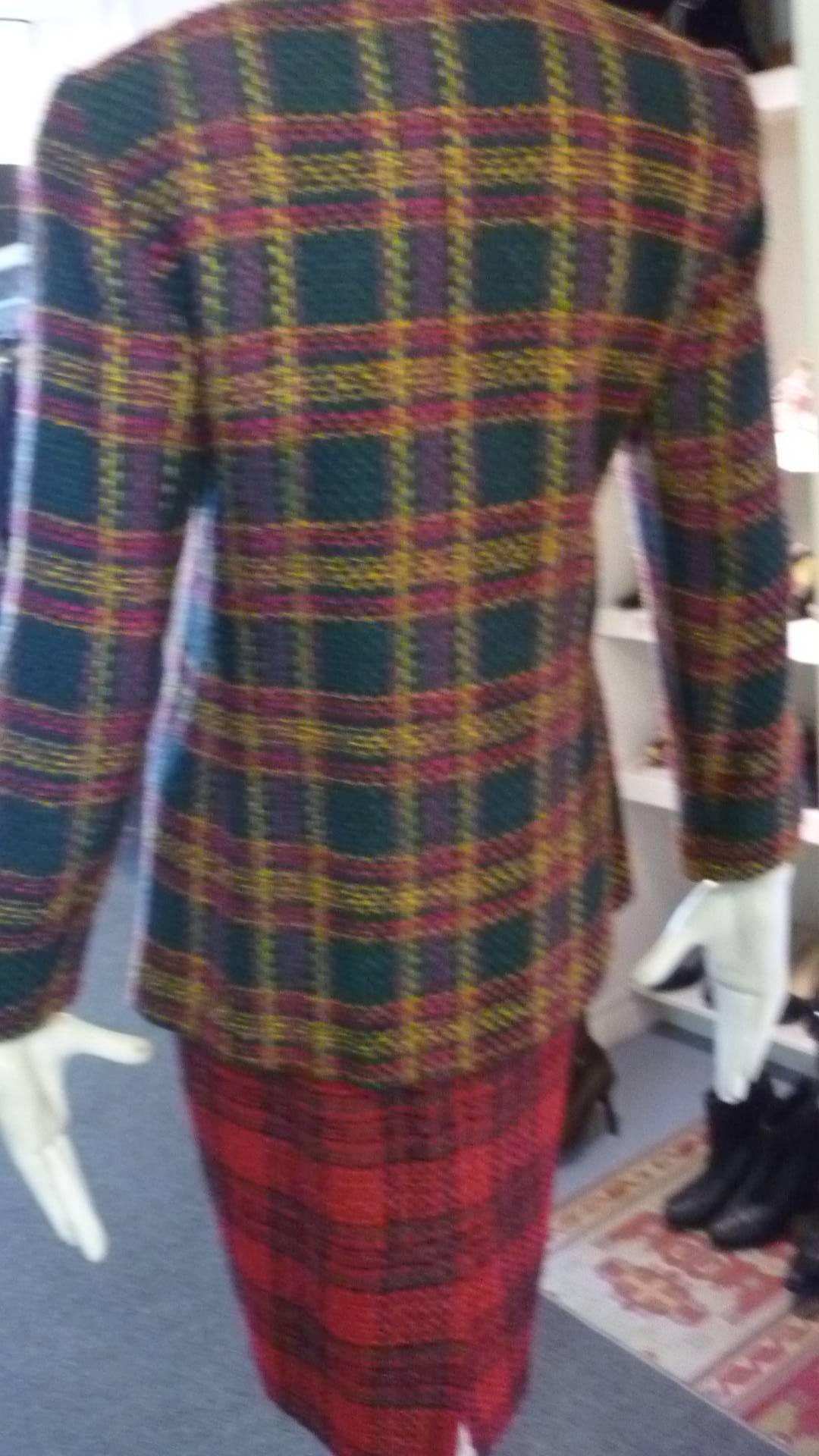 The two pieces are from the same collection with the jacket being a petites and size 8 and the skirt regular and a 6.

Made of a viscose/wool blend the checkered/plaid pieces blend nicely. The jacket has a one button closure and two hip pockets