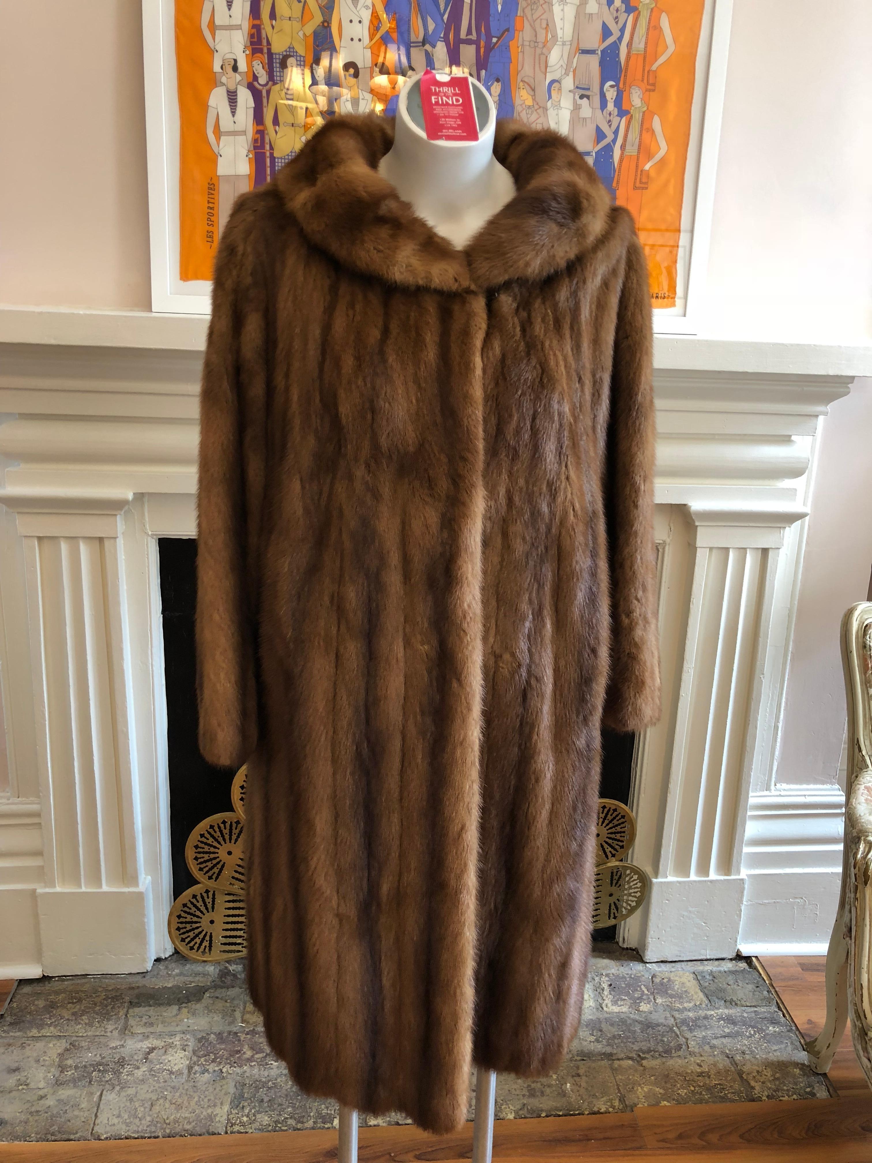 This coat is an early Christian Dior collaboration with Holt Renfrew thought to be during the 1951-53 period. The mink is in excellent condition for its age and has obviously been well taken care of, and that includes the lining. There is a nice