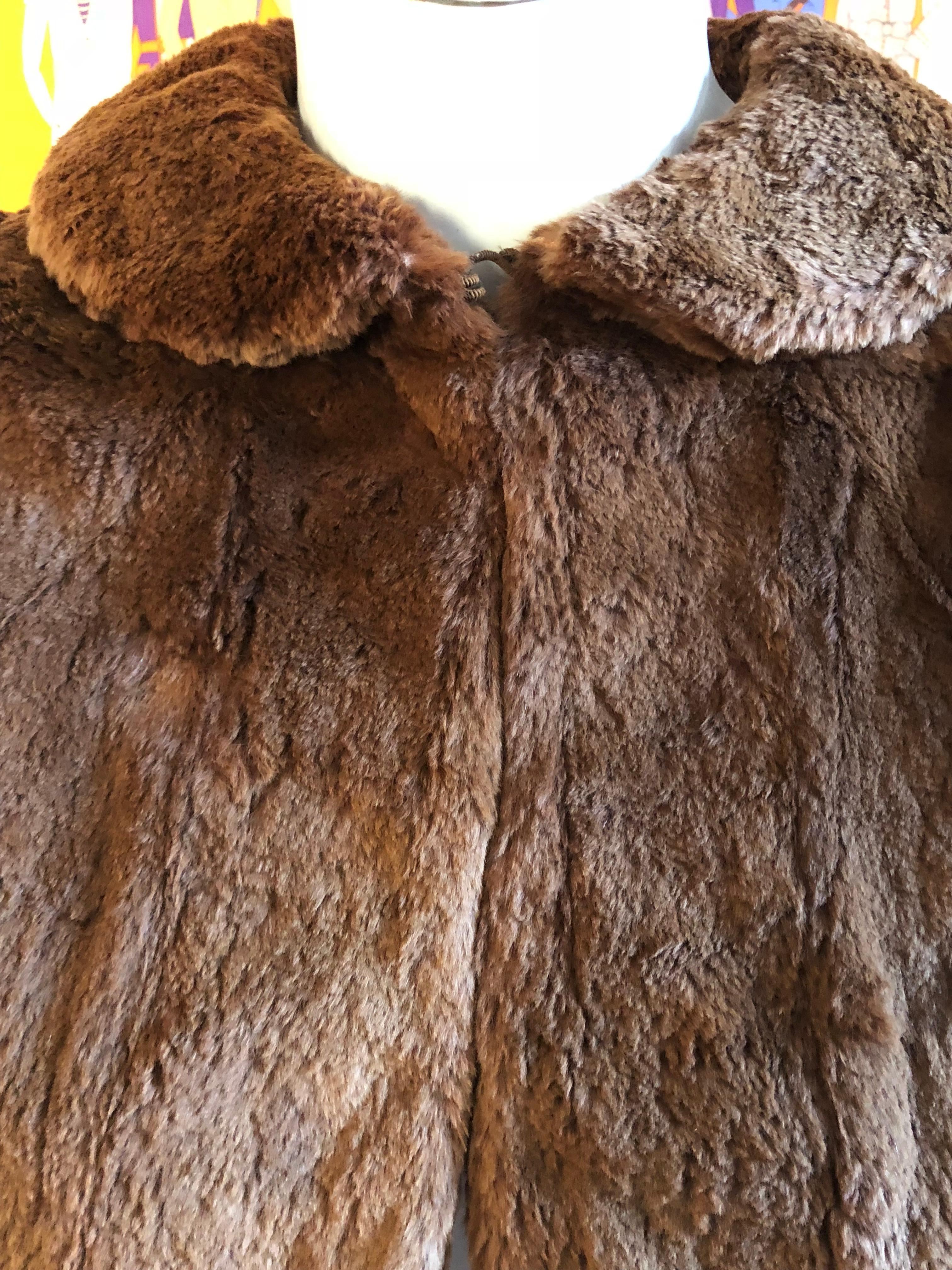In fantastic condition for its age, this sheared beaver cape can be worn for the evening over a dress or equally over a sweater and jeans. Closure is by two hooks and eyes and the back is longer than the front. The lining is invery good shape except
