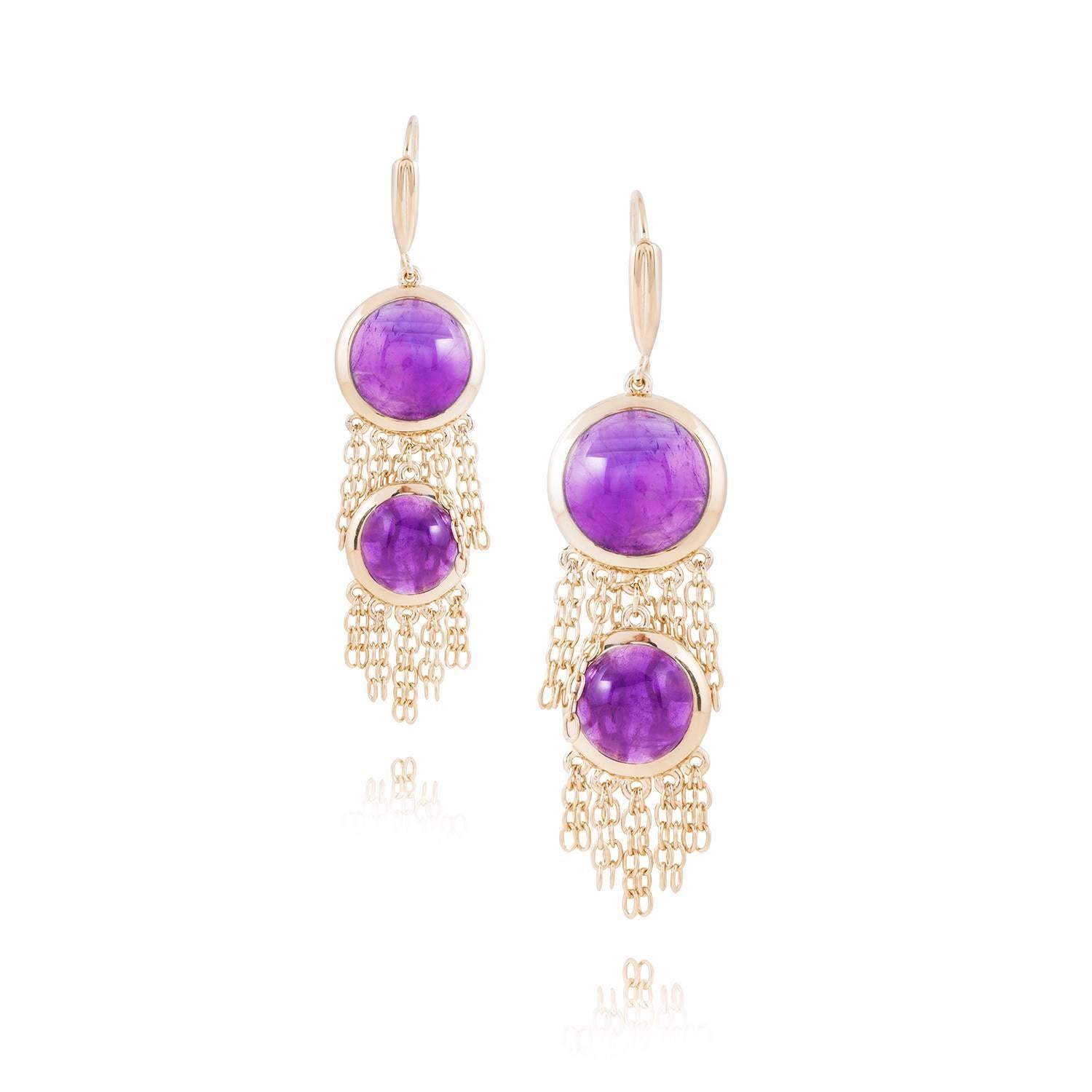 18kt Gold Vermeil (2.5 microns) on 925 Silver (Rhodium coated to enhance the colour of the metal)

These light and delicate chain earrings are perfect for evening or special occasions.

They feature two natural amethyst cabochons with chain