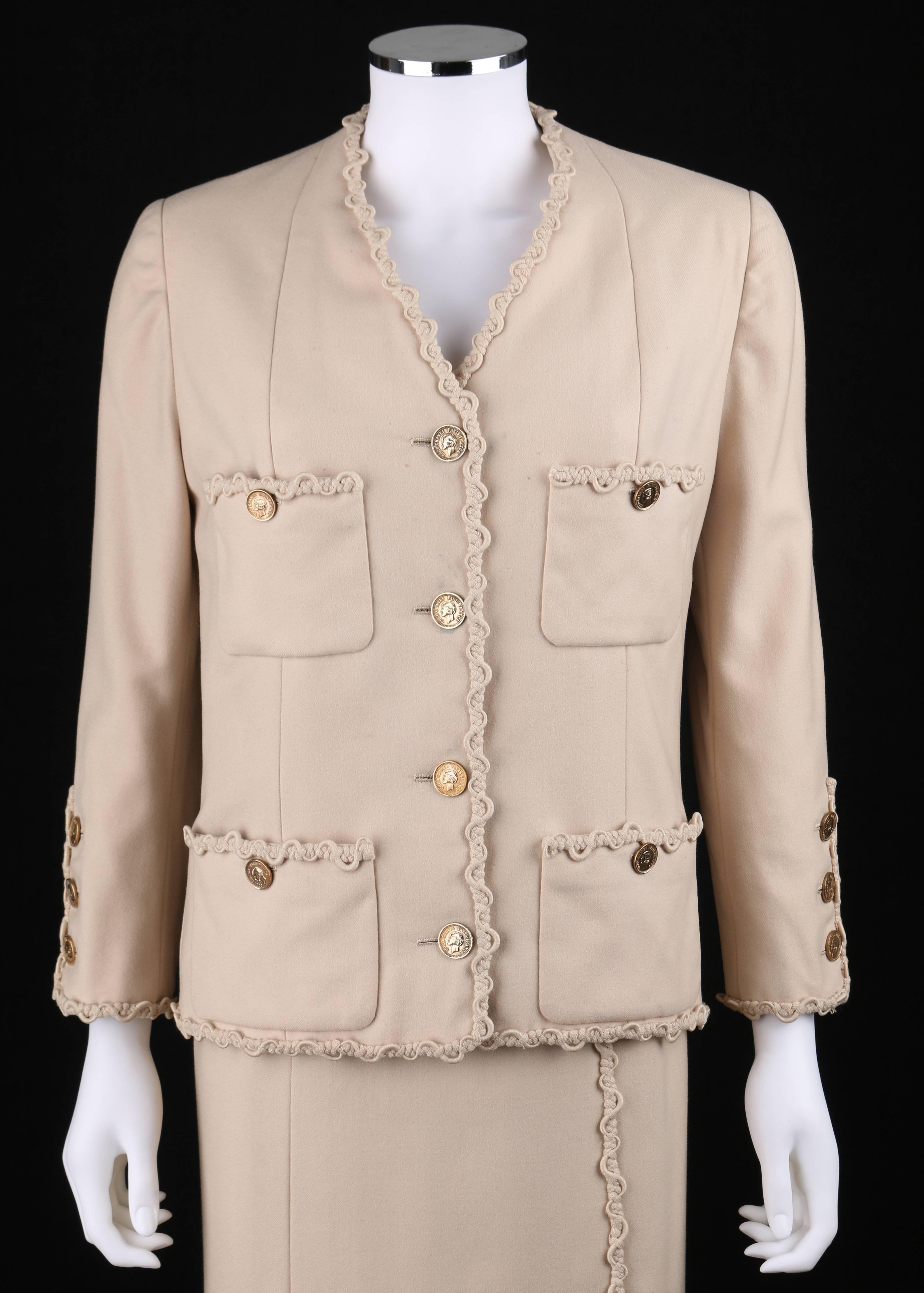 Vintage Chanel c.1980's Haute Couture numbered (64763 and 64764) beige wool skirt suit. Jacket has Coco Chanel portrait buttons. Four small pockets. Buttons at front and cuffs. Chain weighted hem. Skirt closes with zipper. Both pieces are fully