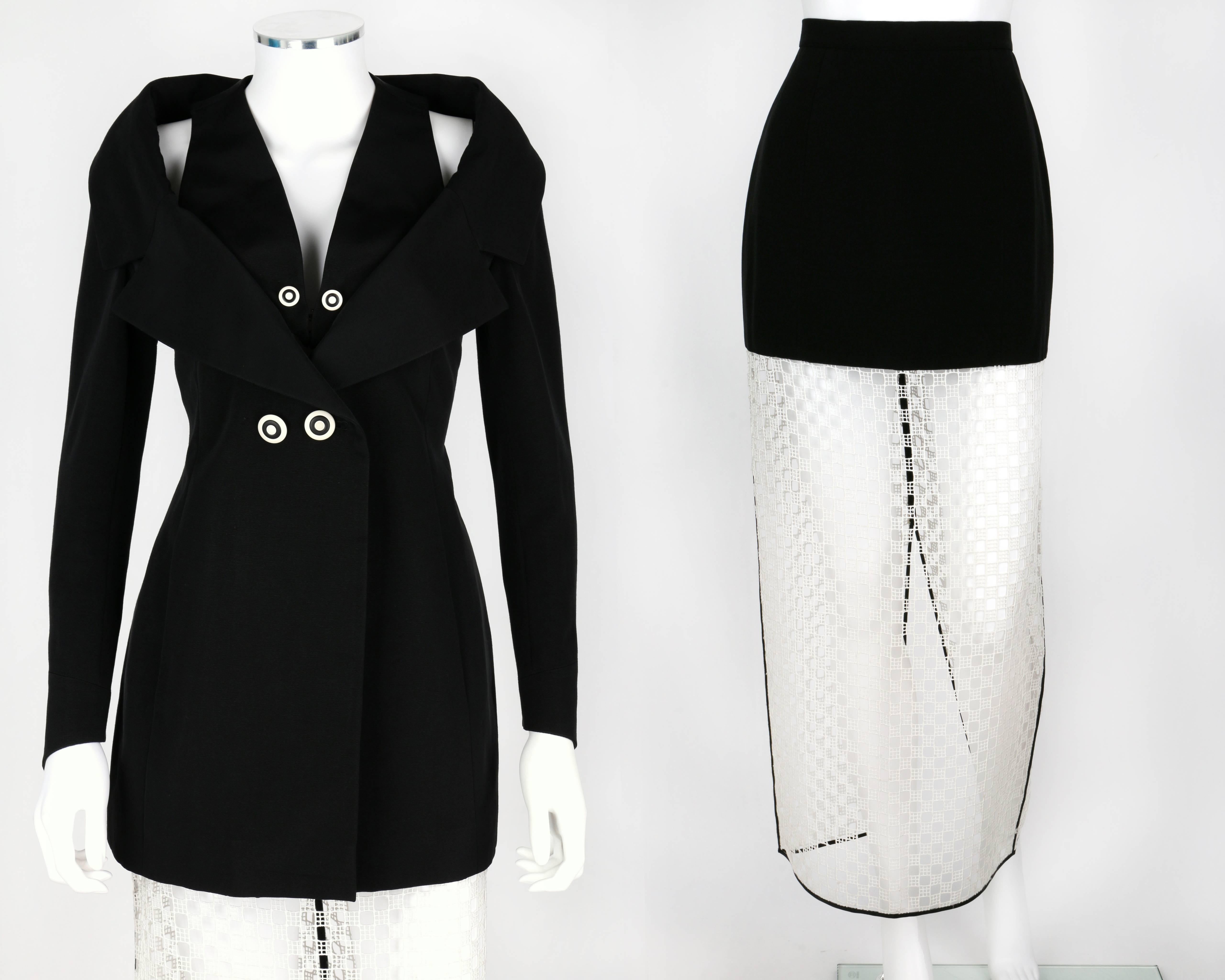 Vintage 1980's Karl Lagerfeld two-piece Avant-Garde skirt suit. Jacket has a layered/structured collar. Black and white contrasting 