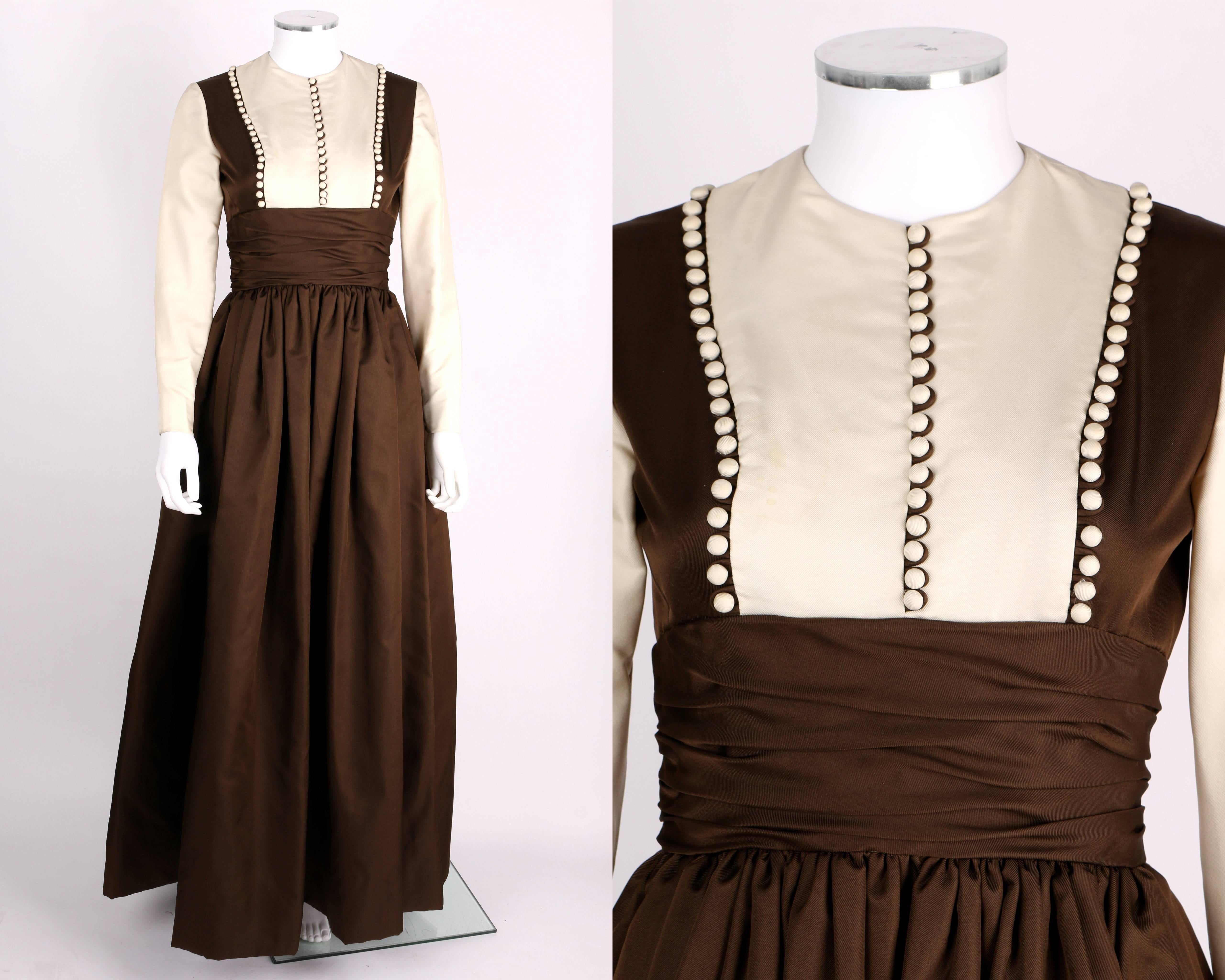 Vintage Fall-Winter 1968 Geoffrey Beene evening dress. Dress was purchased at Bergdorf Goodman on the Plaza New York and is dated November 21, 1968 on interior tag. Dress is ivory and brown silk faille. Vest-like bodice with button detail at pleated