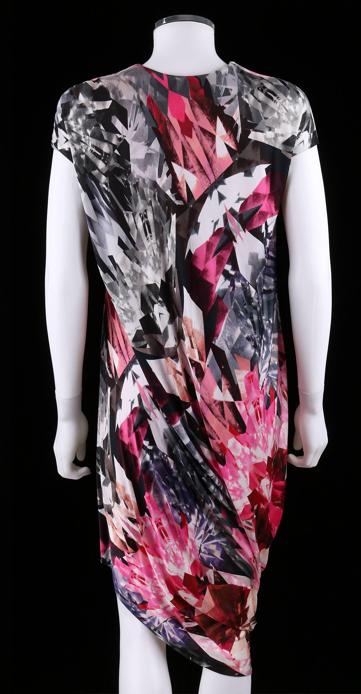 Rare and iconic kaleidoscope print dress in shades of pink, gray, and white.  From Alexander McQueen's Spring-Summer 2009 