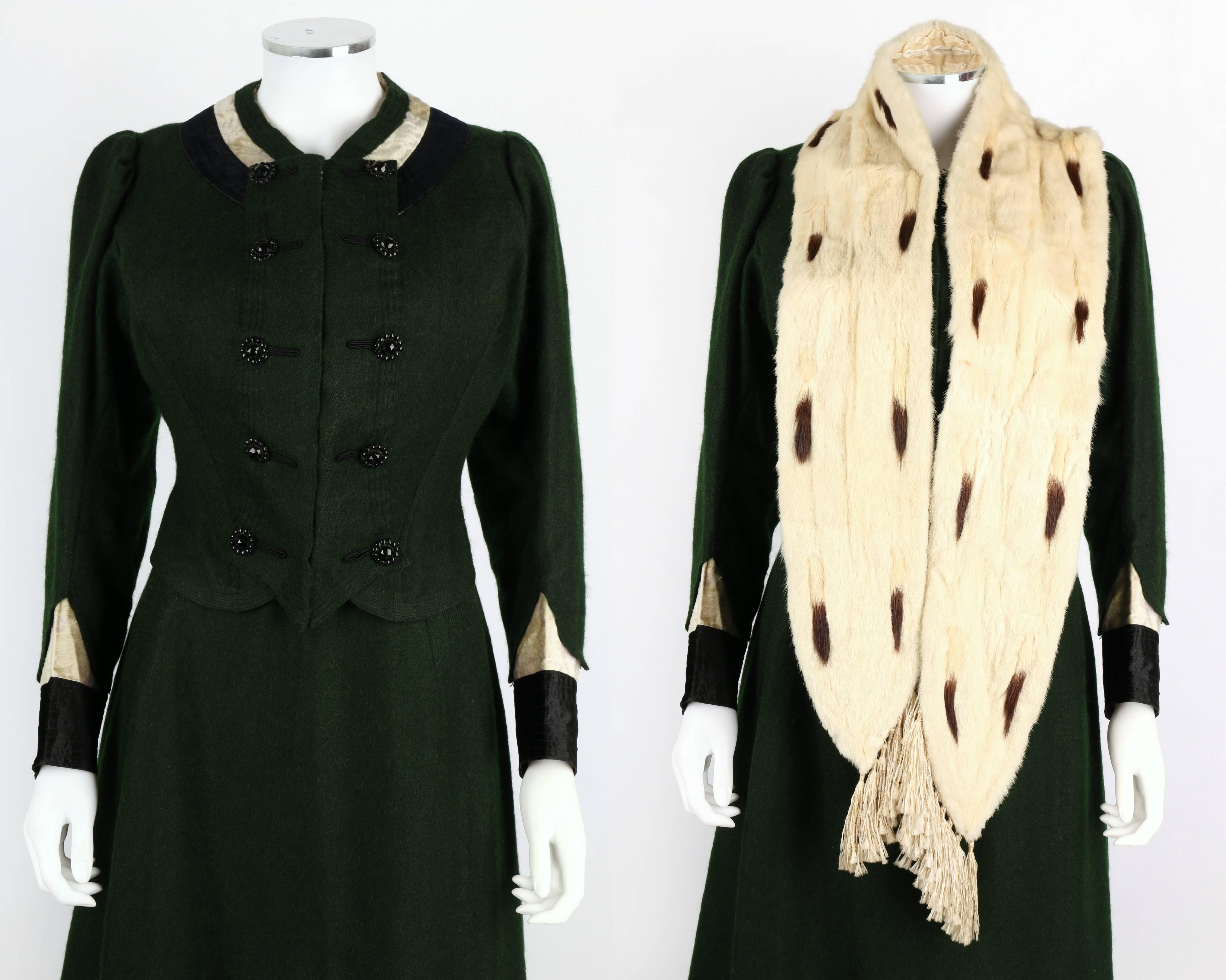 Rare turn of the century green wool two piece suit and genuine fur stole winter ensemble. Suit is trimmed with ivory and midnight blue plush. Jacket has jet button embellishment at front and closes with concealed hooks and eyes. Skirt is unlined and