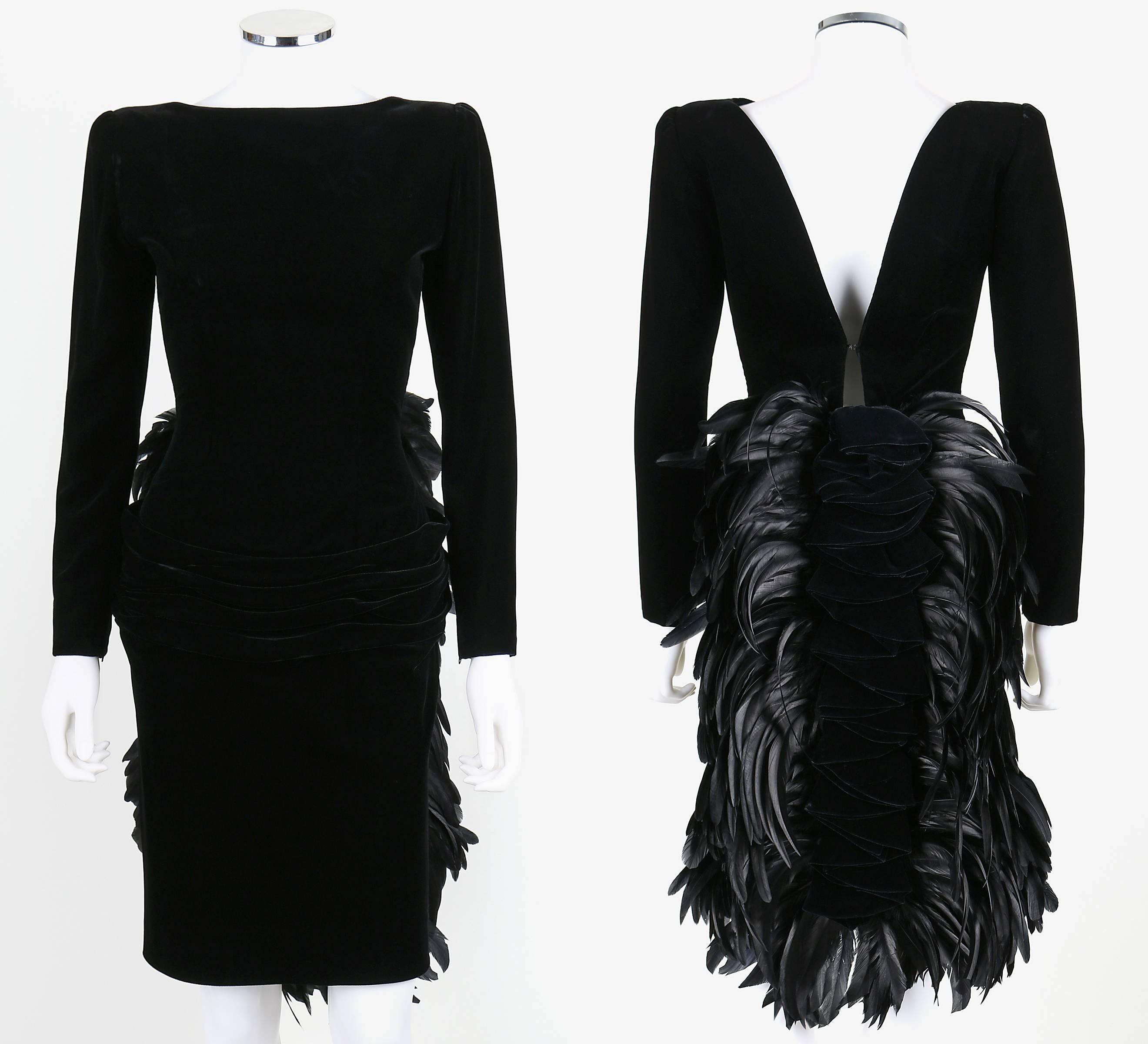 Vintage Oscar de la Renta cocktail dress from the Autumn/Winter 1987 collection. Plunging v-cut back. Back of skirt is embellished with a black coq feather and ruffled velvet bustle. Dress has long sleeves which zip at the cuffs. Padded shoulders.