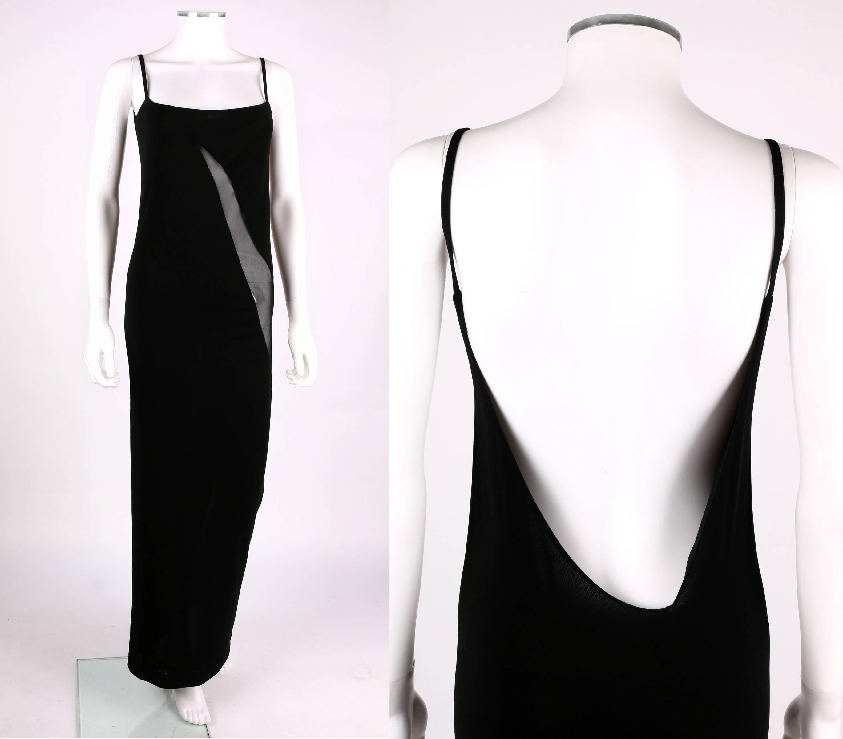 Vintage c.1990's Tom Ford for Gucci black spaghetti strap evening dress. Low-cut back. Sheer net panel starts at bust and wraps around to back hem. Slip on dress. Lined. Marked Fabric Content: 