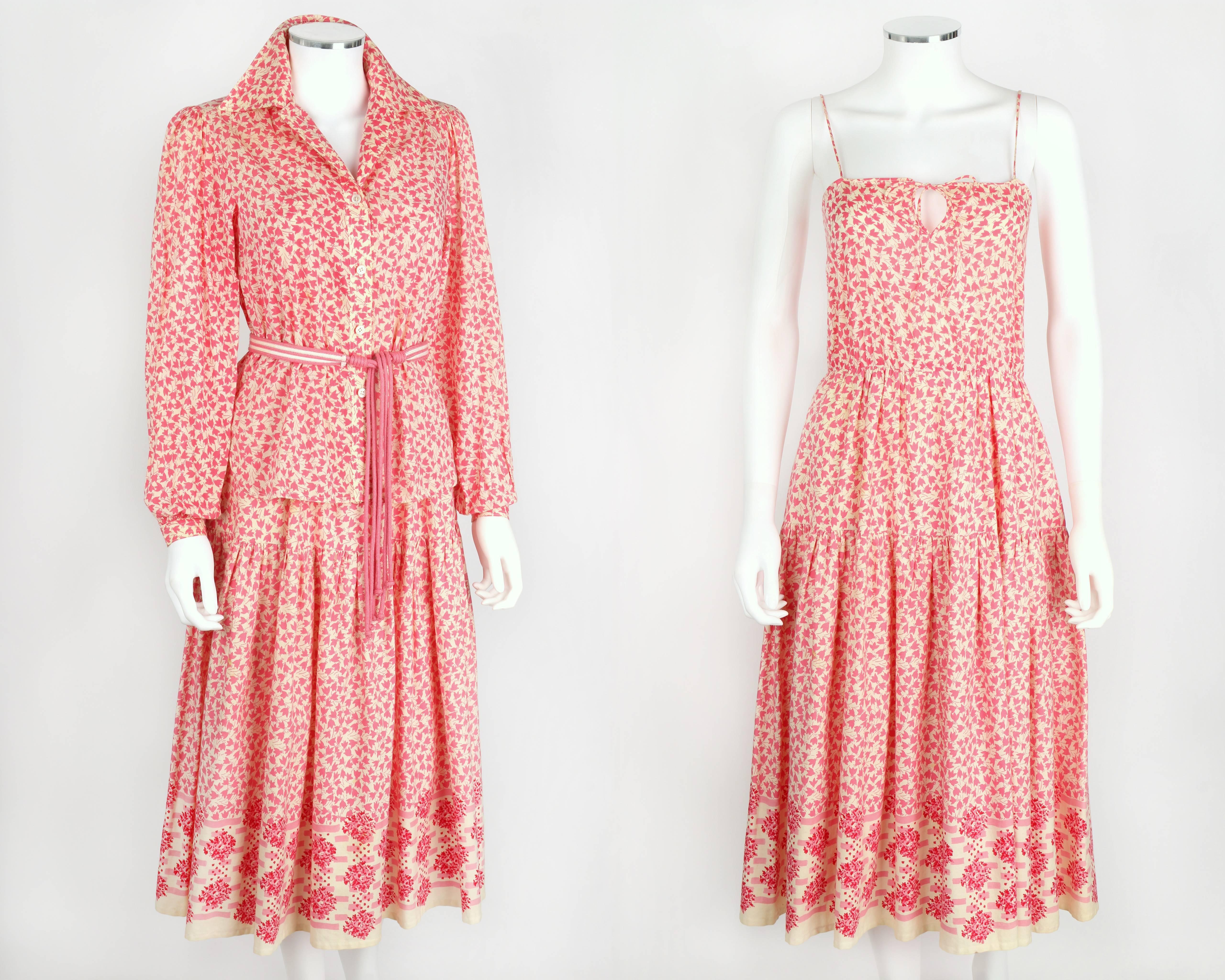 Vintage 1970s Oscar de la Renta ivory and pink floral print cotton ensemble. Spaghetti strap sundress has a tie keyhole detail at front. Buttons and zips at back. Long sleeve top buttons at front and cuffs. Yoke back. Matching scarf and rope belt.