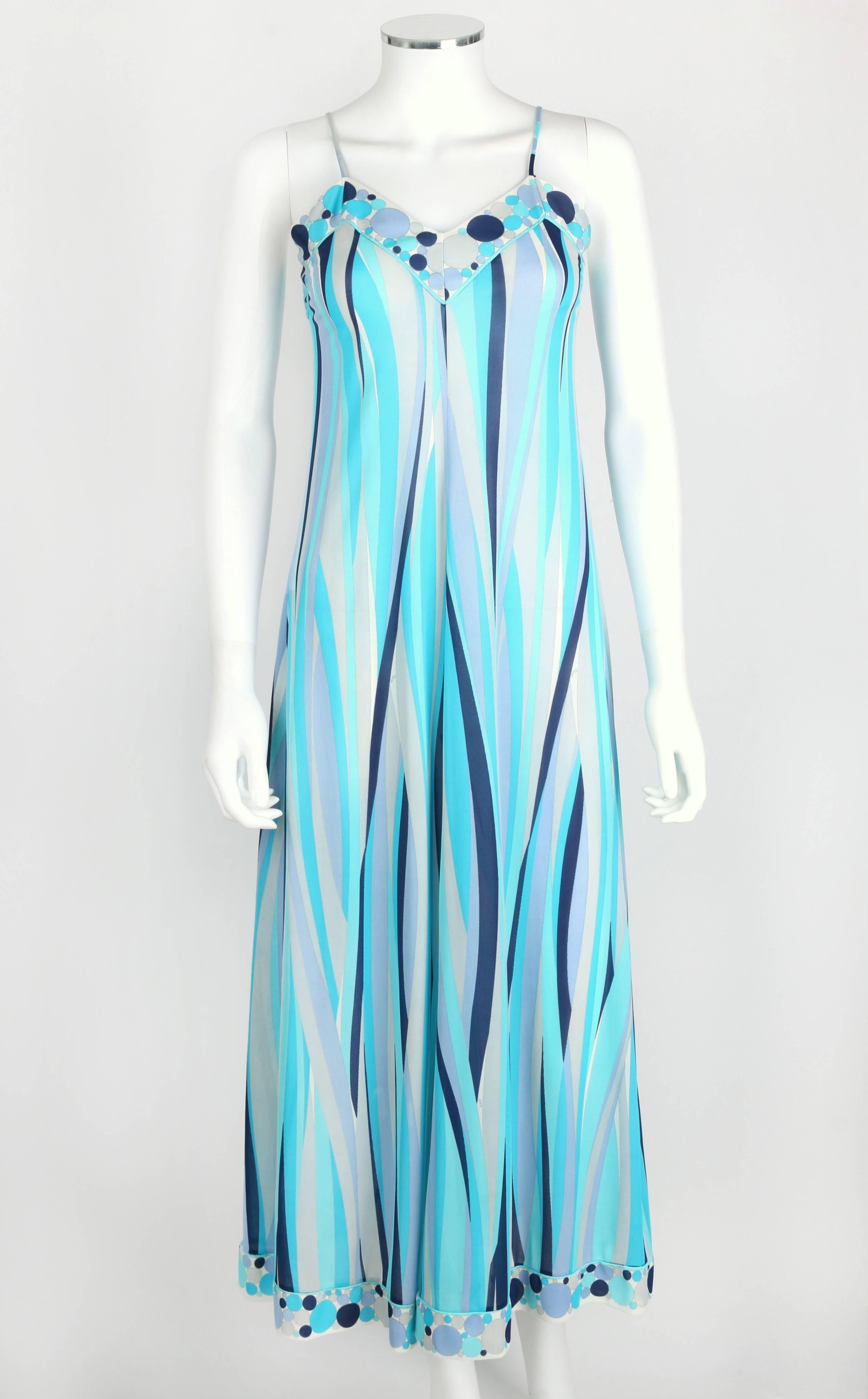 Vintage c.1960s Emilio Pucci for Formfit Rogers two piece maxi dress/lounge set in shades of blue and gray. Spaghetti strap slip dress. Circle decorative border on v-neckline and hem. Over-dress has long raglan sleeves with button detail at cuff.