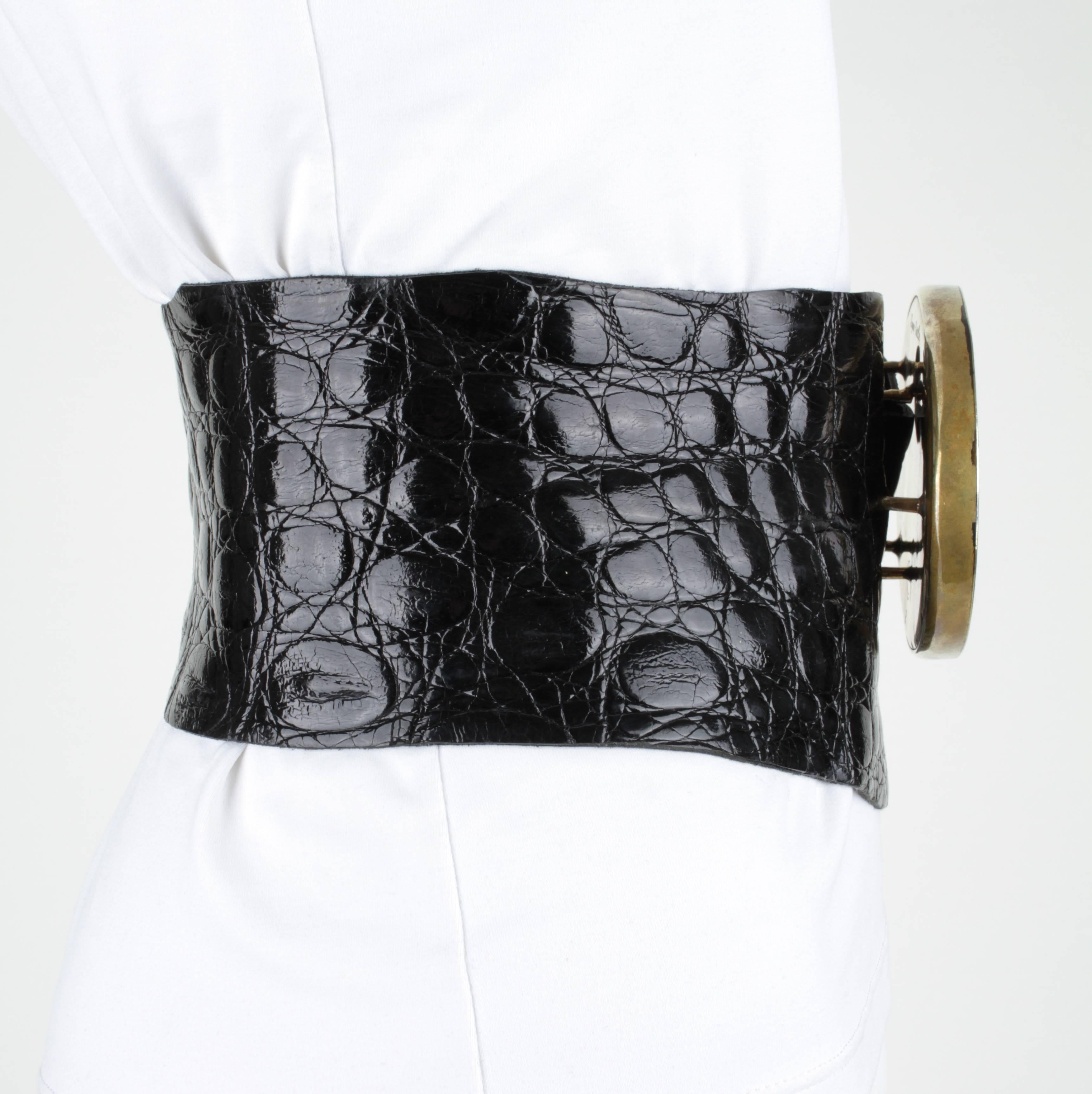 One-of-a-Kind Lynn Tuttle wide black Alligator embossed leather belt with large statement brass and stone buckle. Asymmetrical raw edge cut leather belt. Buckle detaches from leather belt by snaps. Stamped 