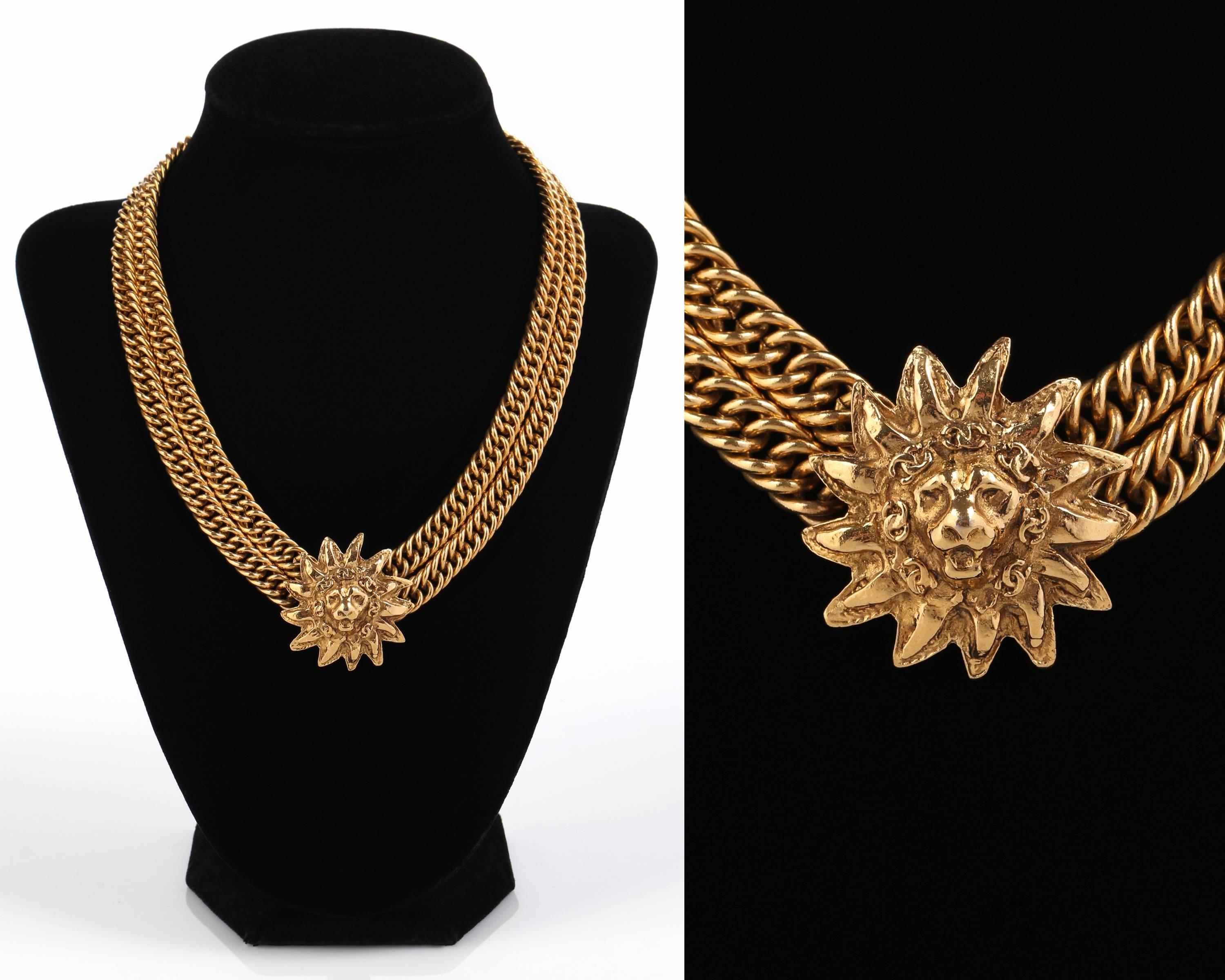 Vintage early c.1980's Chanel CC logo Lion sun gold tone double chain necklace.  Lion head sun pendant is mounted on center of double chunky curb chains measures approximately 1 1/4