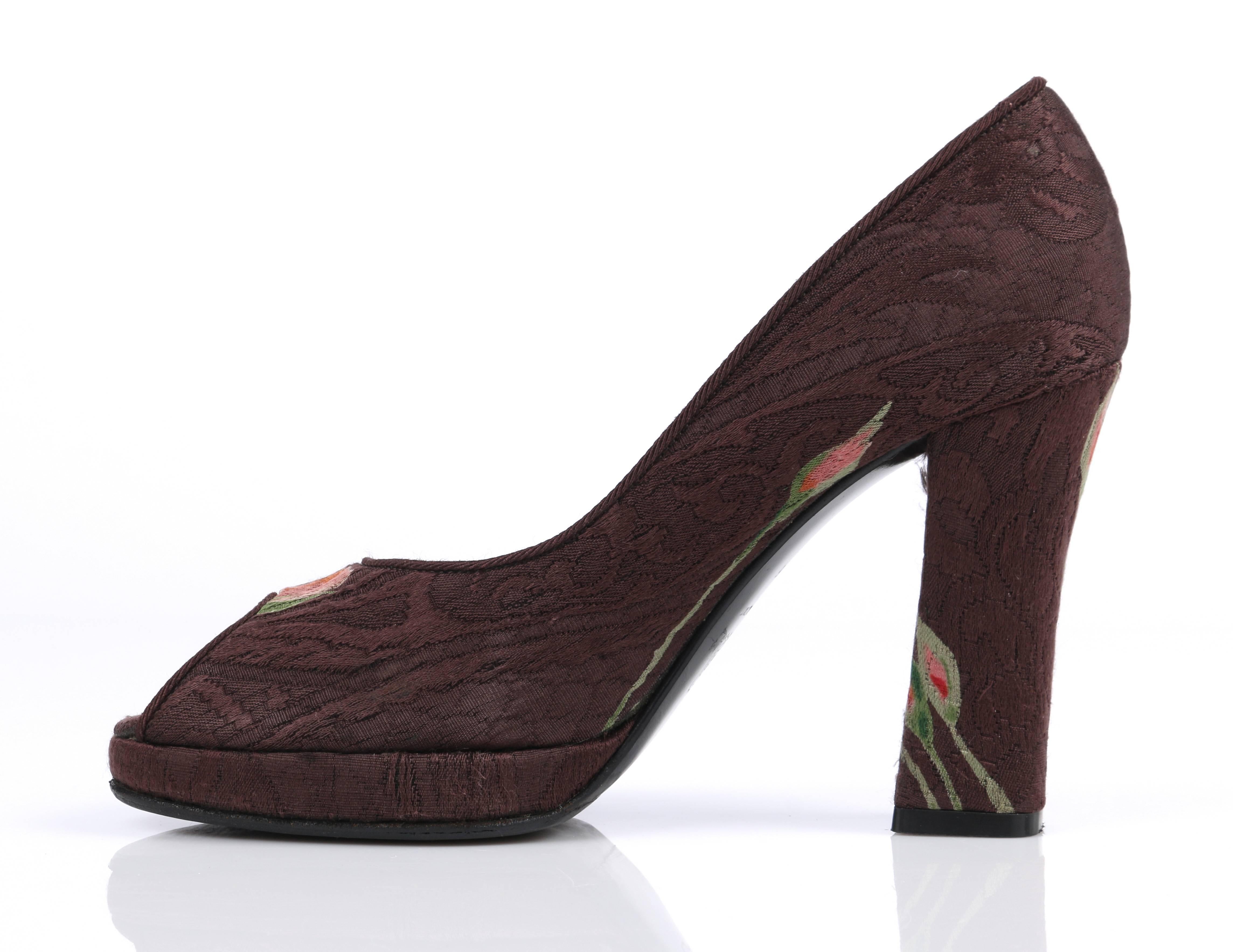 Dolce & Gabbana brown floral brocade peep toe platform pumps. Upper is a brown floral brocade. Peep toe. Low platform. High squared covered heel. Marked Material: Sole is marked 