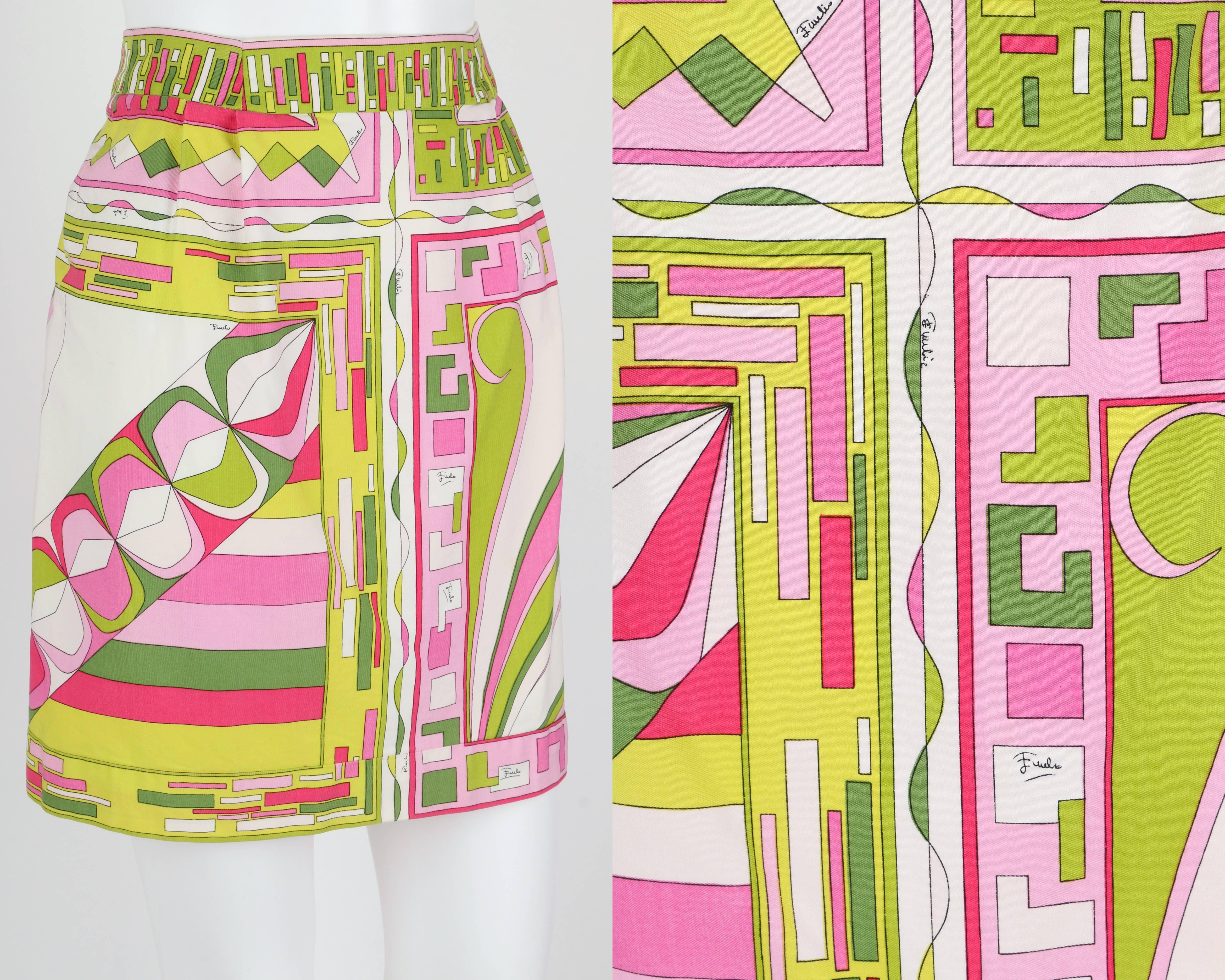 Vintage c.1960's Emilio Pucci shades of green, pink and white signature print cotton mini skirt. Front center split geometric motif. Double back zipper closure at each hip. Unlined. Please note that this item was pinned to better fit our mannequin