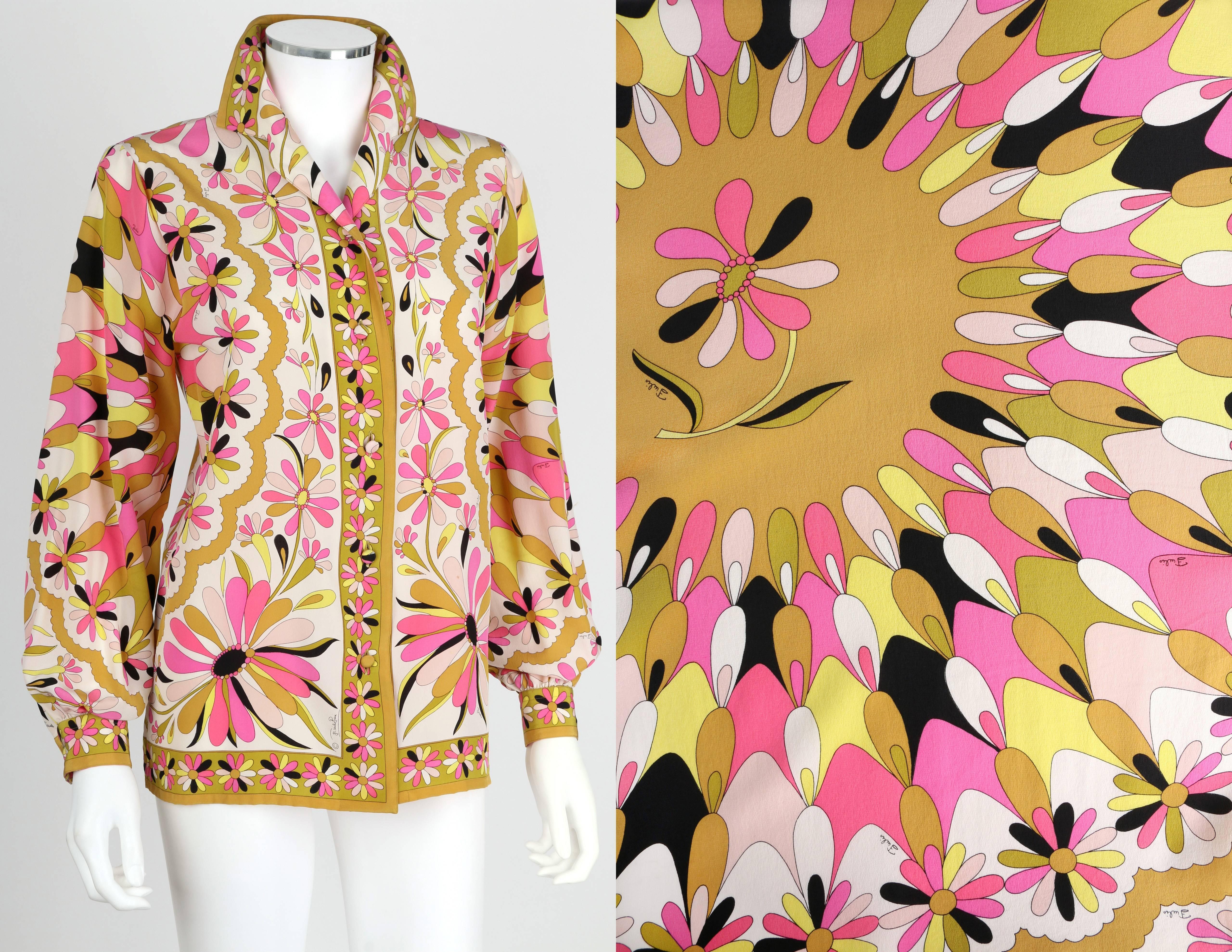 Vintage c.1970's Emilio Pucci pink, chartreuse, black and off white kaleidoscope daisy / floral print button down blouse. Cuff long sleeves with button detailing. Spread collar. Decorative floral border around collar, closure, cuff, and hem. Center