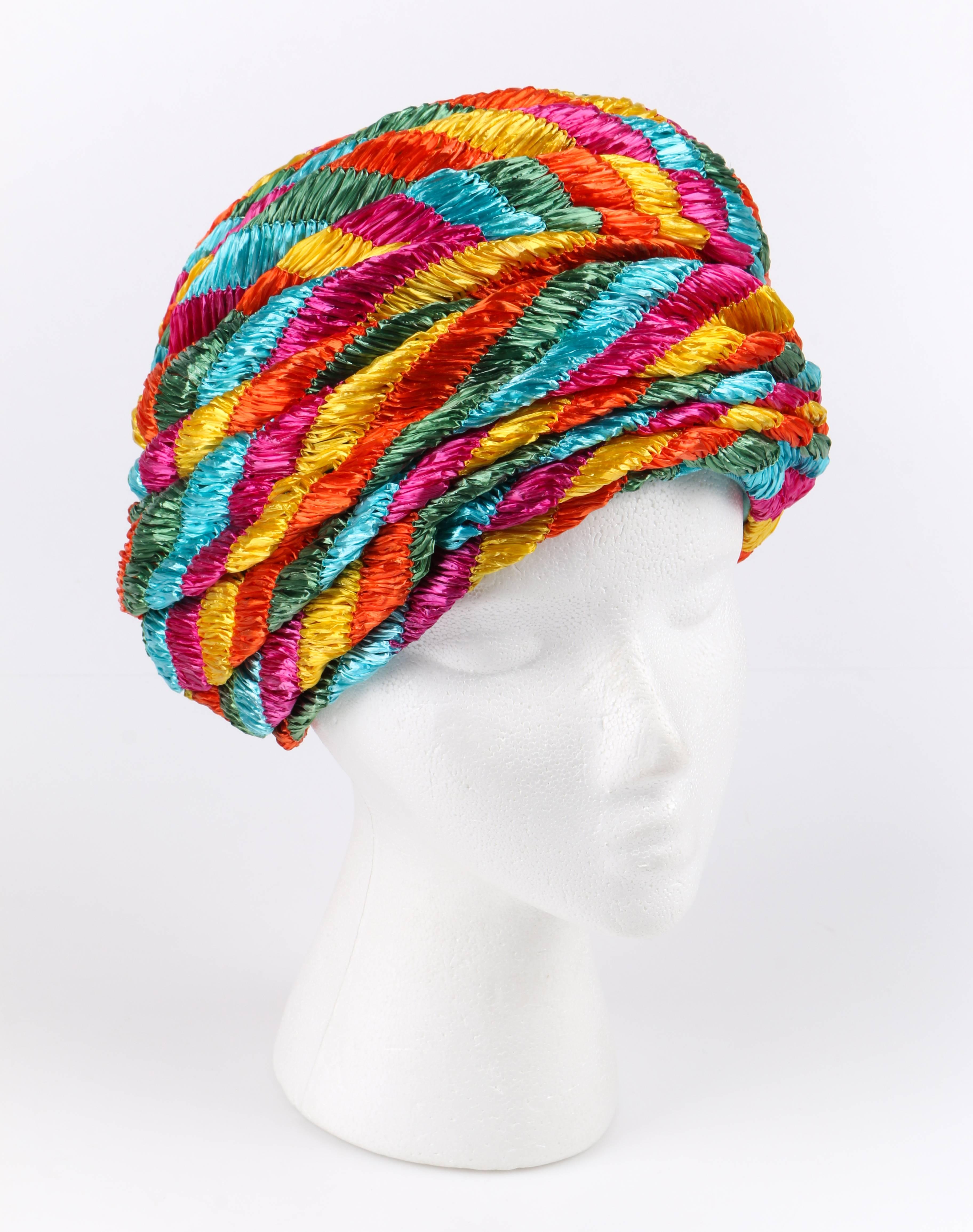 Vintage c.1960's Christian Dior glossy multicolor pleated straw turban hat. Pink, yellow, green, blue, and orange structured gathered pleat straw body. Straw wraps around head for beehive appearance. Aqua blue faille silk lined. Unmarked Fabric